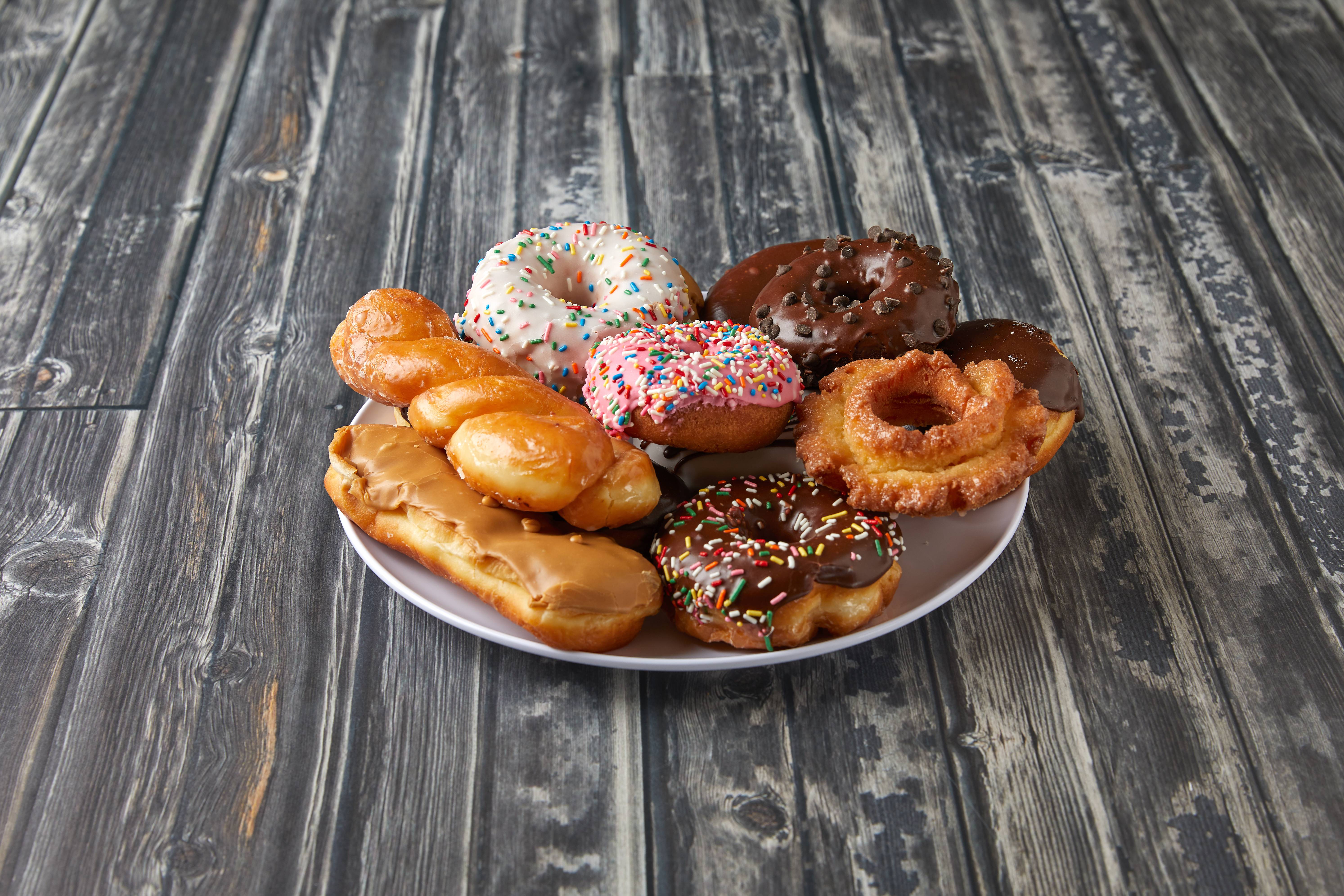 Order Dozen Mix food online from Foster Donuts store, Bakersfield on bringmethat.com