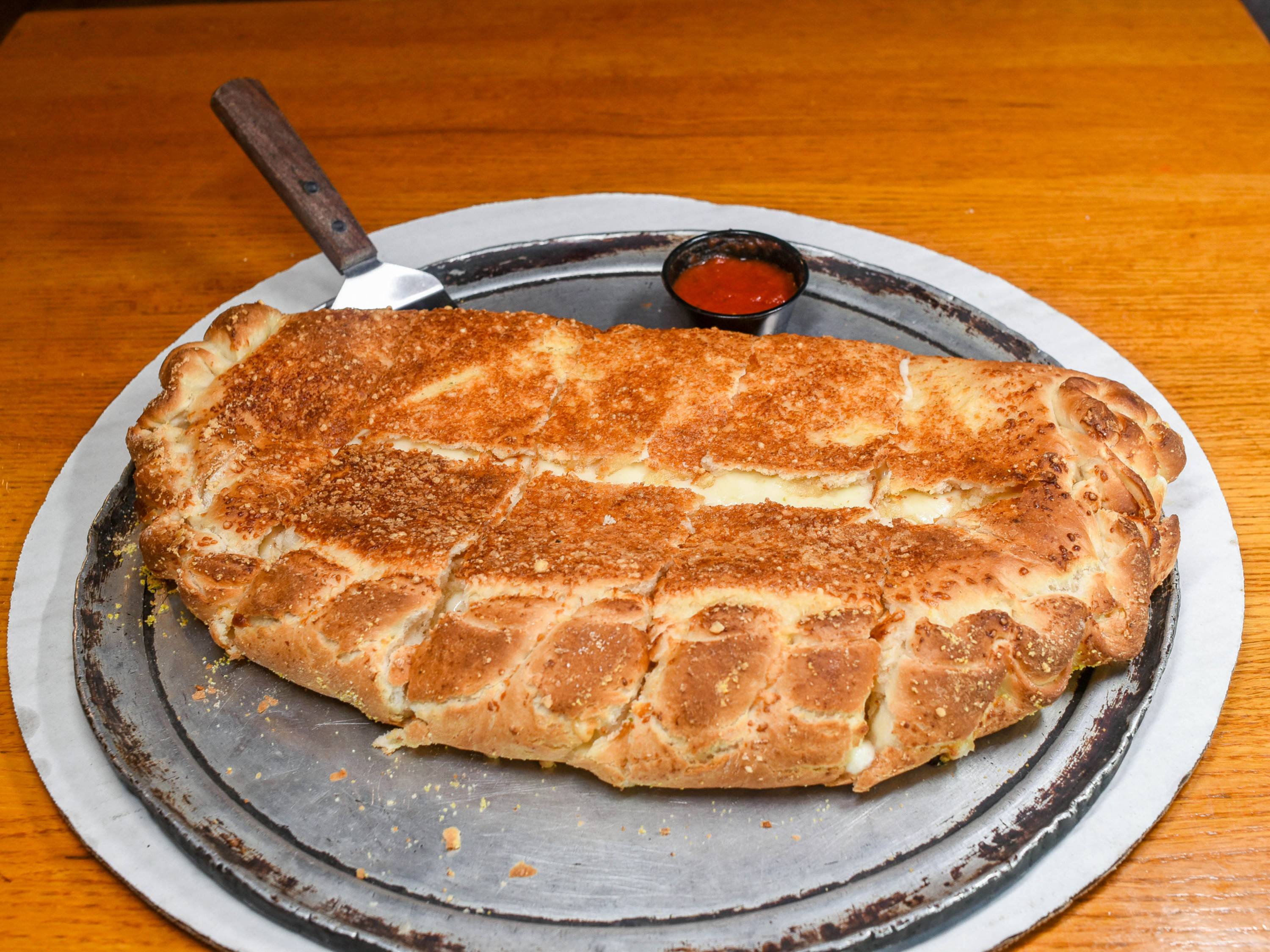 Order Mozzarella Cheese Calzone food online from Peoria Pizza Works store, Peoria Heights on bringmethat.com