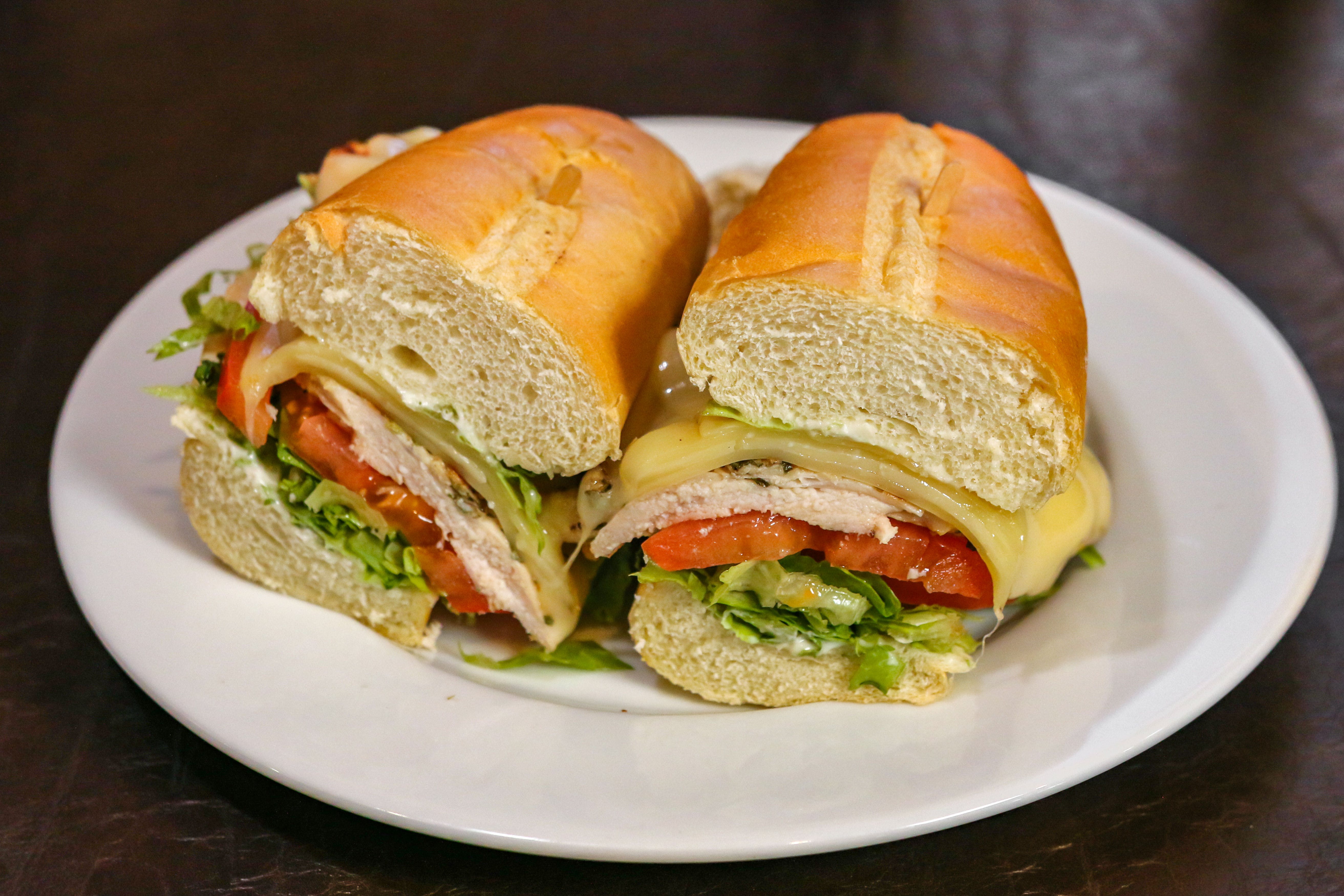 Order Cajun Chicken Sandwich - Sandwich food online from Villa Roma store, Laguna Hills on bringmethat.com