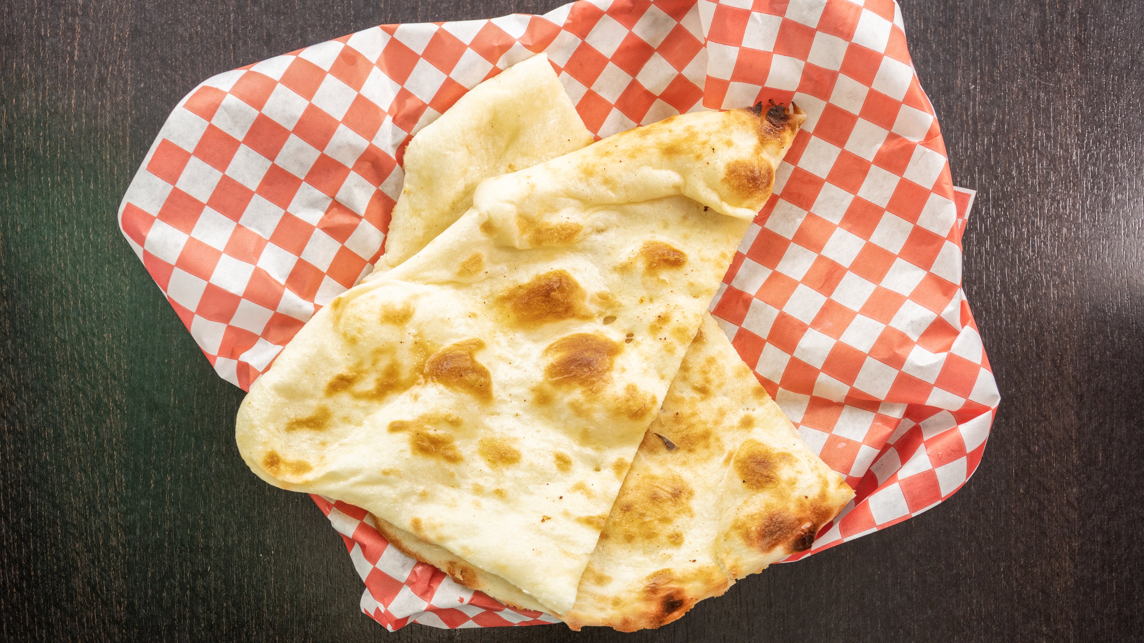 Order Butter Naan food online from Hyderabad House store, Indianapolis on bringmethat.com