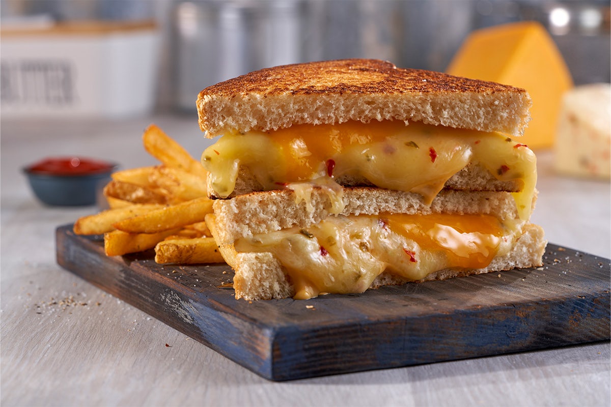 Order New! Triple Grilled Cheese food online from Cotton Patch Cafe store, Lewisville on bringmethat.com