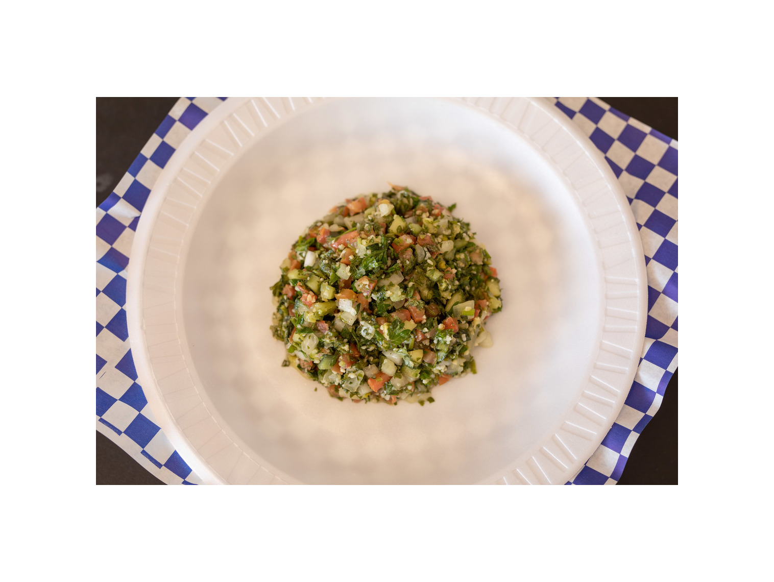 Order Tabouli Salad food online from Gyro Hero store, Norman on bringmethat.com