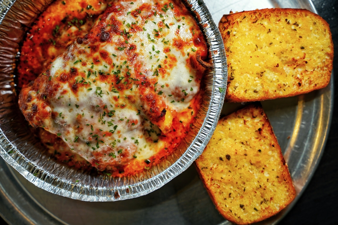 Order LASAGNA food online from Daddyo's Pizza store, Houston on bringmethat.com