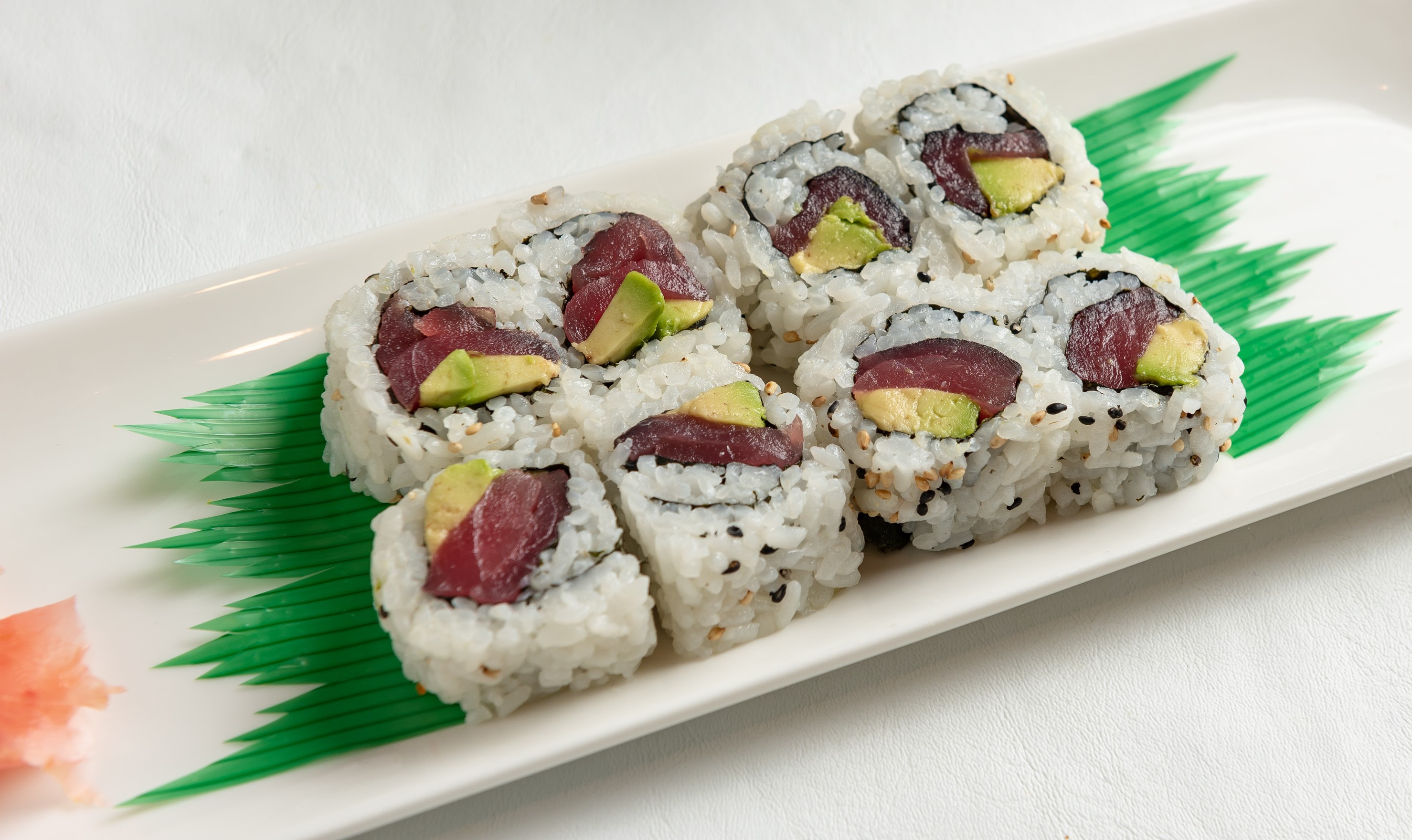 Order Tuna Avocado Roll food online from Phuket Thai Restaurant and Sushi store, Huntsville on bringmethat.com