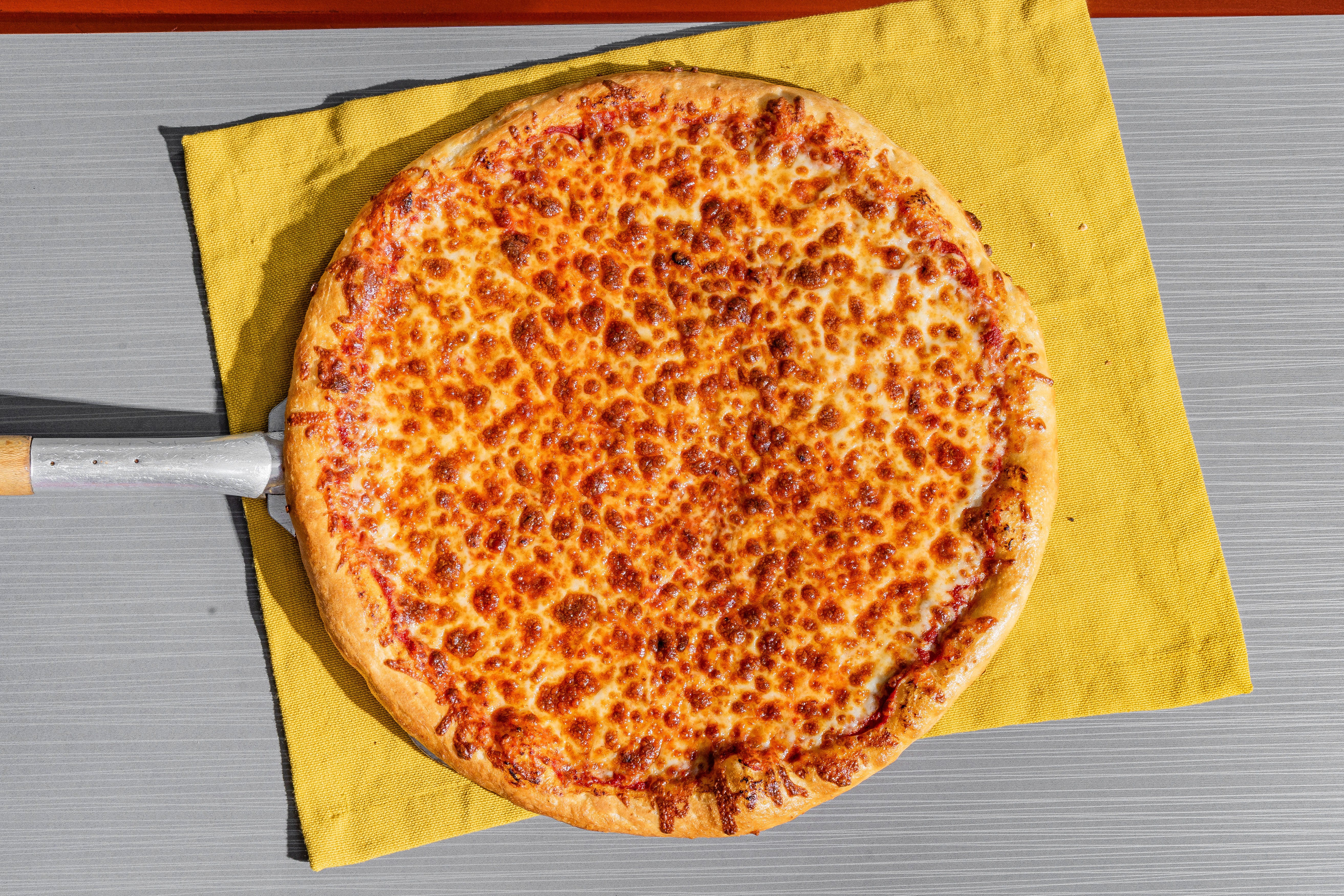 Order Homemade Crust Cheese Pizza - Small 10" (6 Slices) food online from Cavura Pizza store, North Olmsted on bringmethat.com