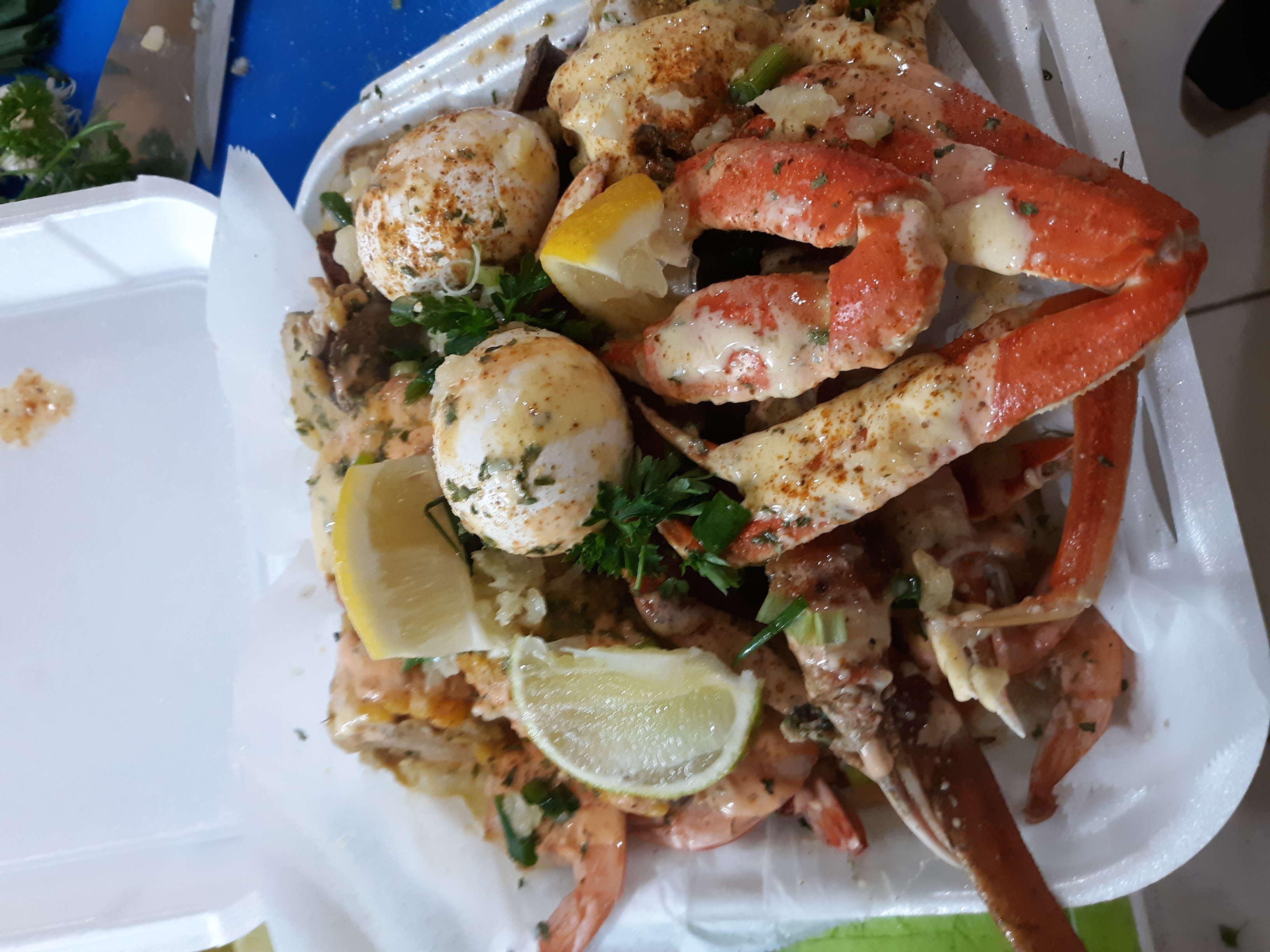 Order 2 Snow Crab Legs Deluxe Tray with Eggs, Corn, and Potatoes food online from Hot Grits And Crab Legs Seafood store, Cordele on bringmethat.com
