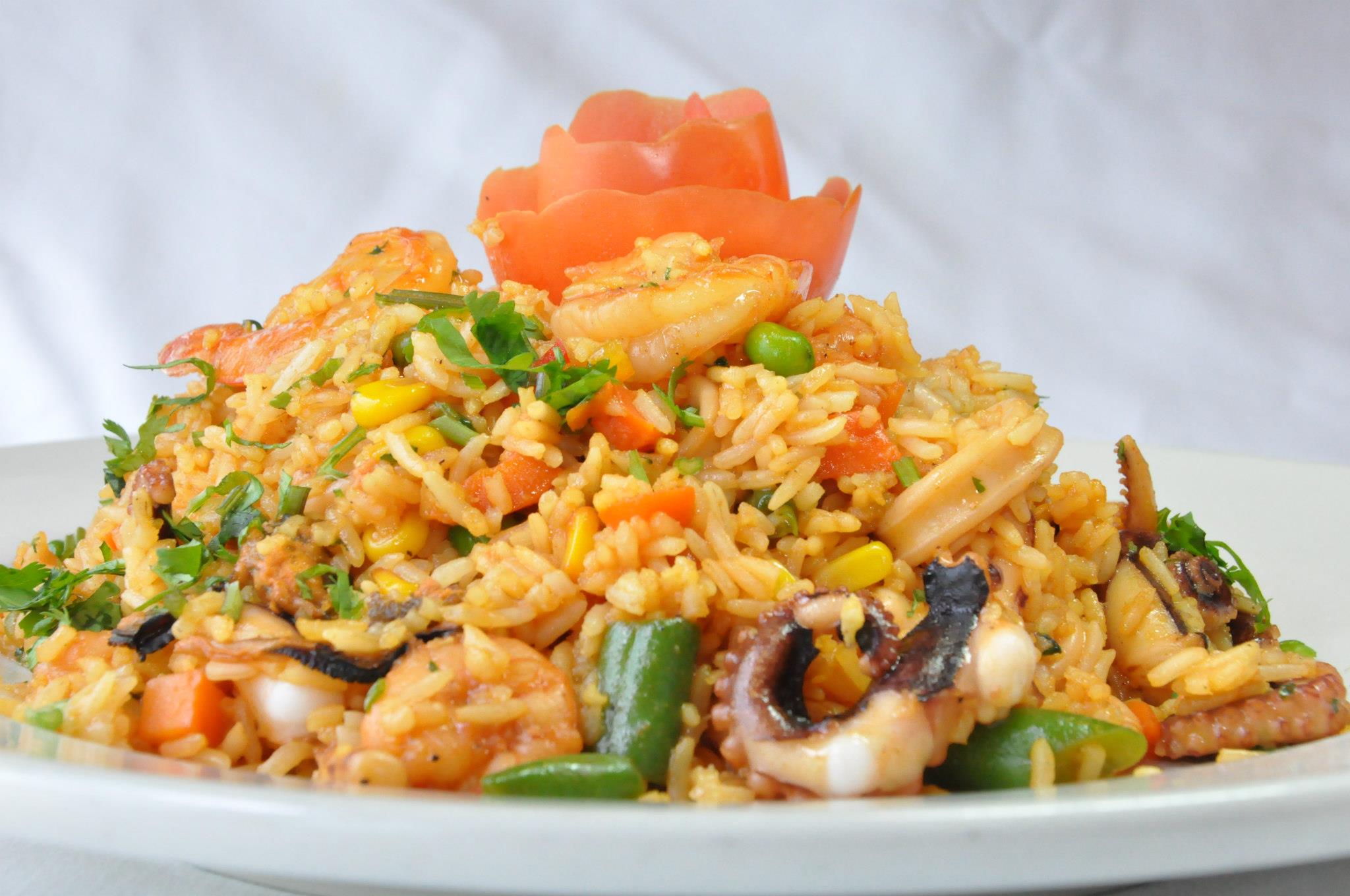 Order 36. Arroz con Mariscos food online from Mily & Lalo Peruvian Restaurant store, Charlotte on bringmethat.com
