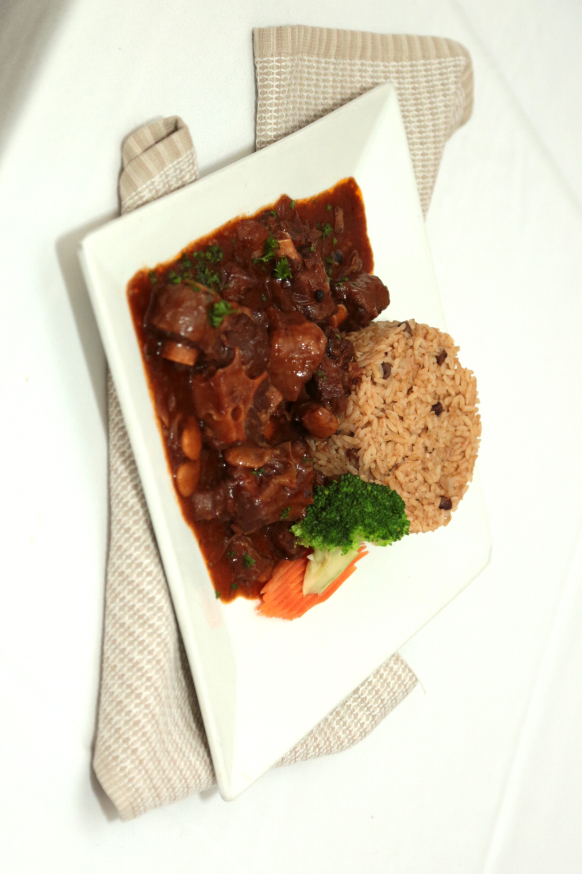 Order Oxtail and Beans food online from Henrica Restaurant store, Rosedale on bringmethat.com