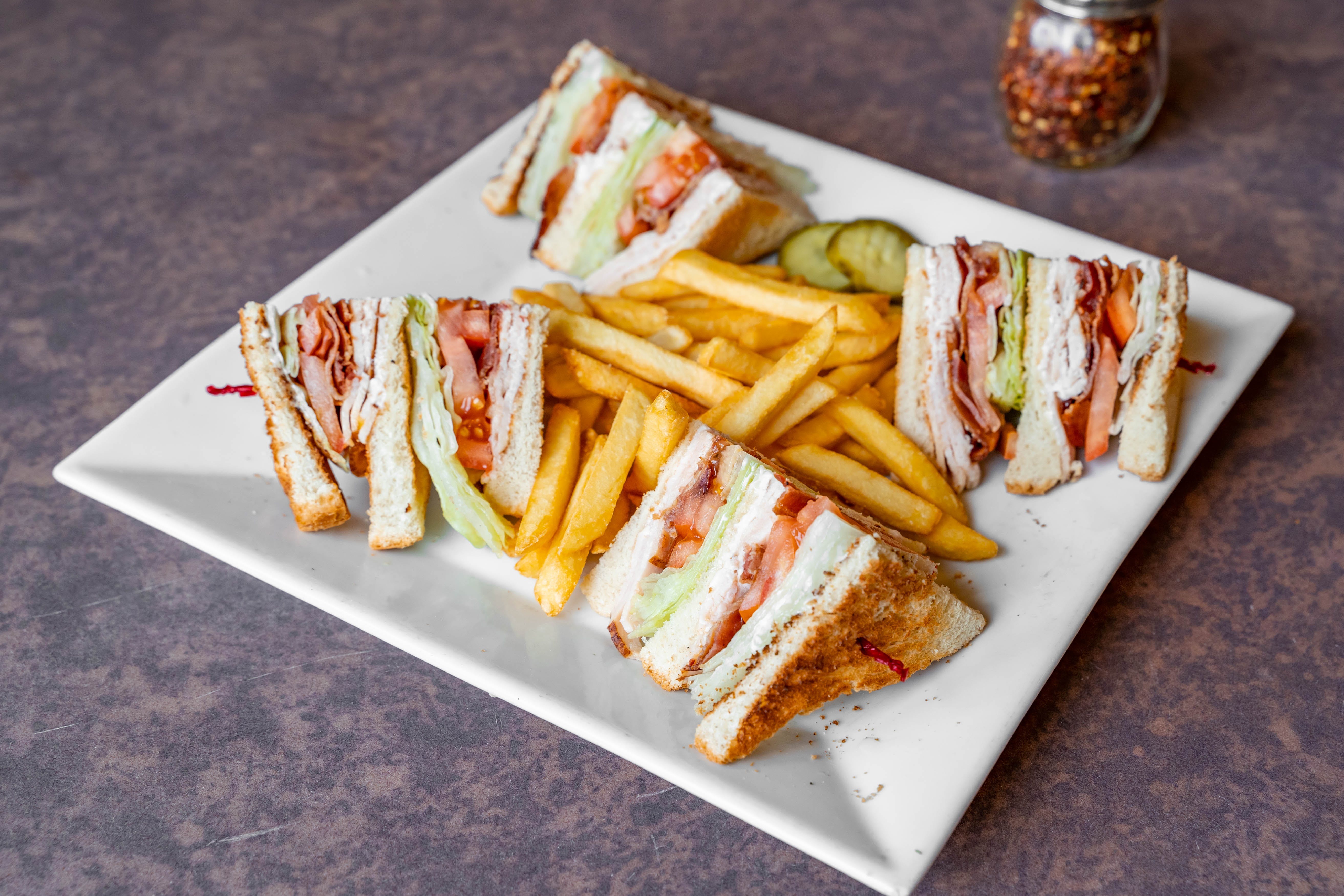 Order Turkey Club Sandwich - Sandwich food online from Father & Sons store, Woodbury on bringmethat.com