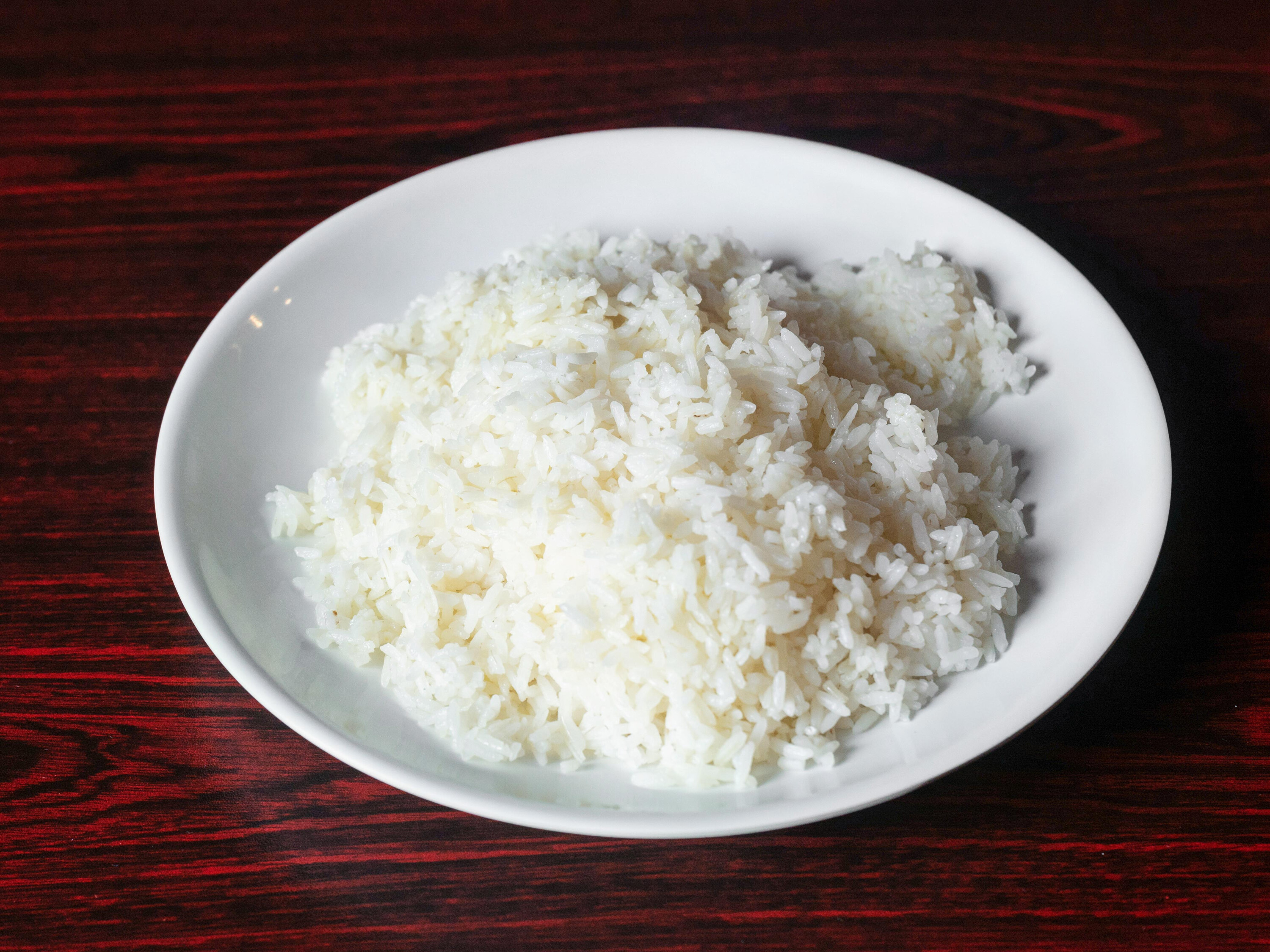Order D14. Steam Rice food online from Asahi Japanese Grill store, Lenoir City on bringmethat.com