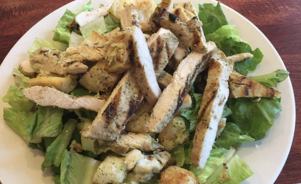 Order Caesar Salad food online from Luigis Famous Pizza store, Little Silver on bringmethat.com