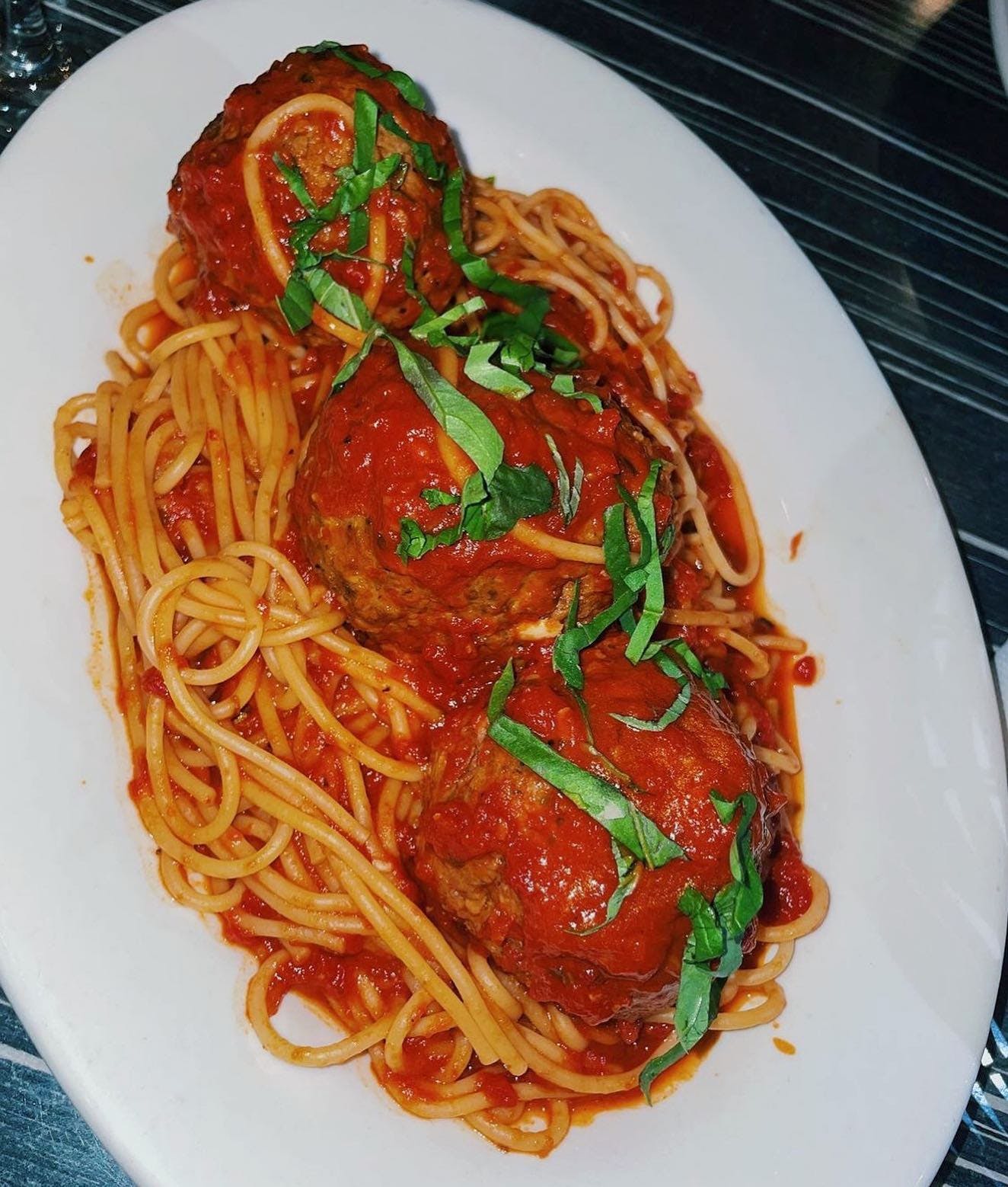 Order Spaghetti with Meatballs - Pasta food online from Napoli Pizza store, Meriden on bringmethat.com
