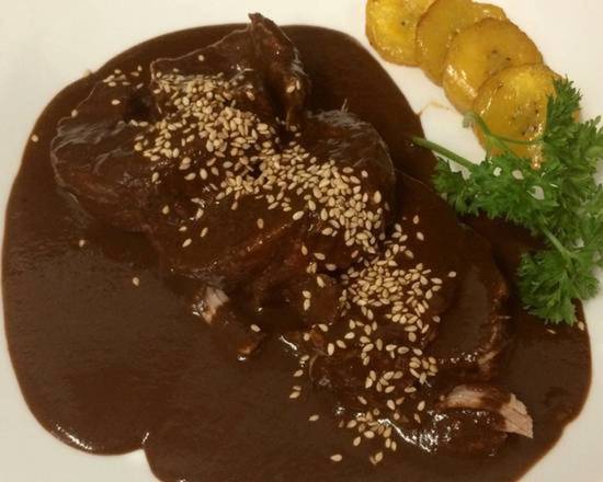 Order Traditional Mole Poblano food online from La Casita Mexicana store, Bell on bringmethat.com