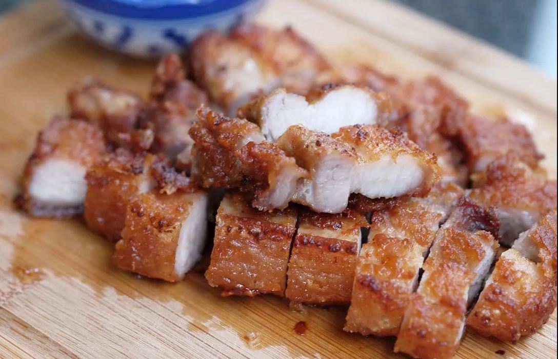 Order A09 Crispy Pork belly food online from Pho Vieng store, Fort Worth on bringmethat.com