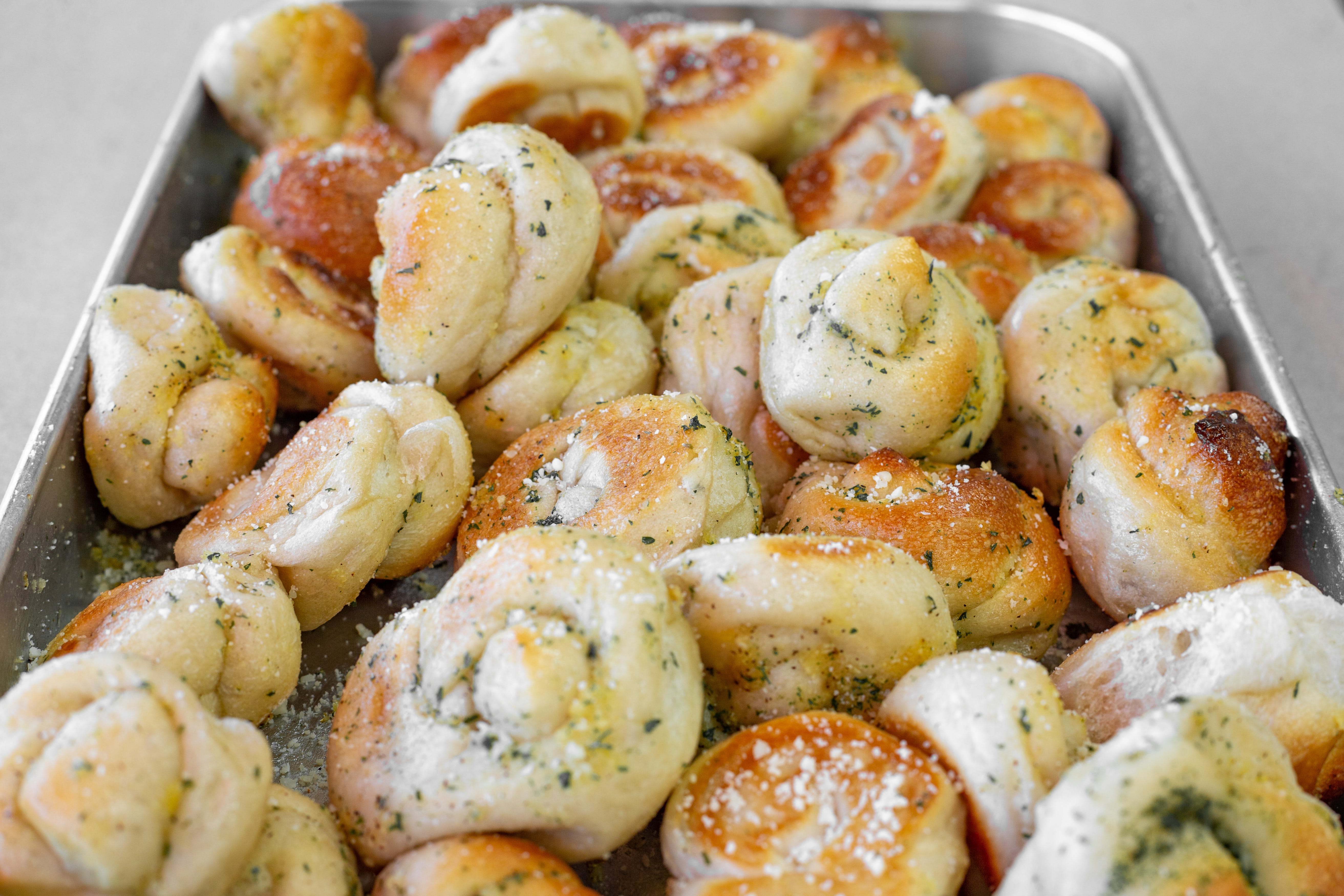 Order Garlic Knots - 1 Piece food online from La Famosa Pizza store, Holtsville on bringmethat.com