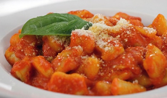 Order Gnocchi di patate al pomodoro  food online from IL Baretto To Go store, New York on bringmethat.com