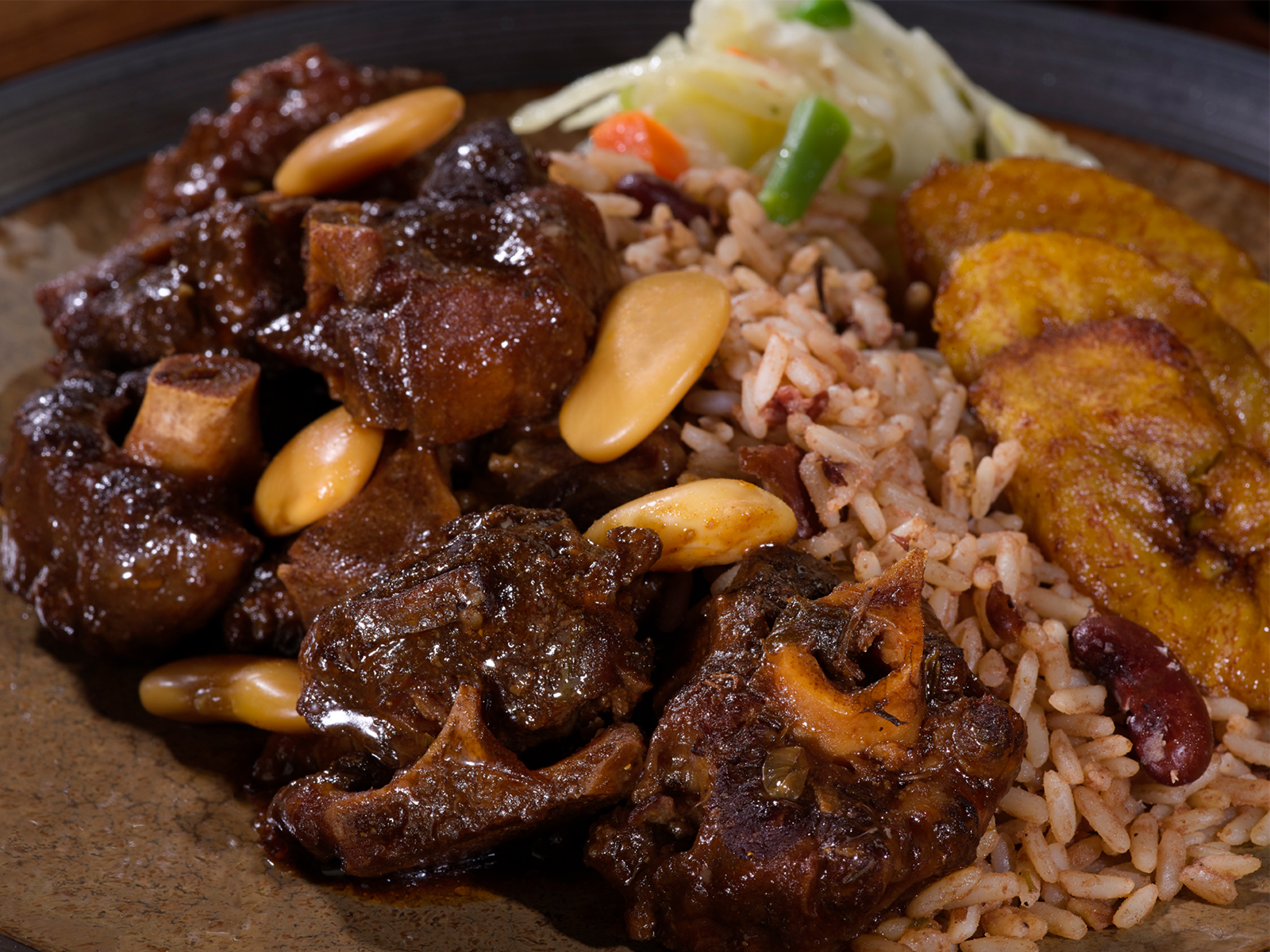 Order Braised Oxtail Meal food online from Golden Krust store, City of Orange on bringmethat.com