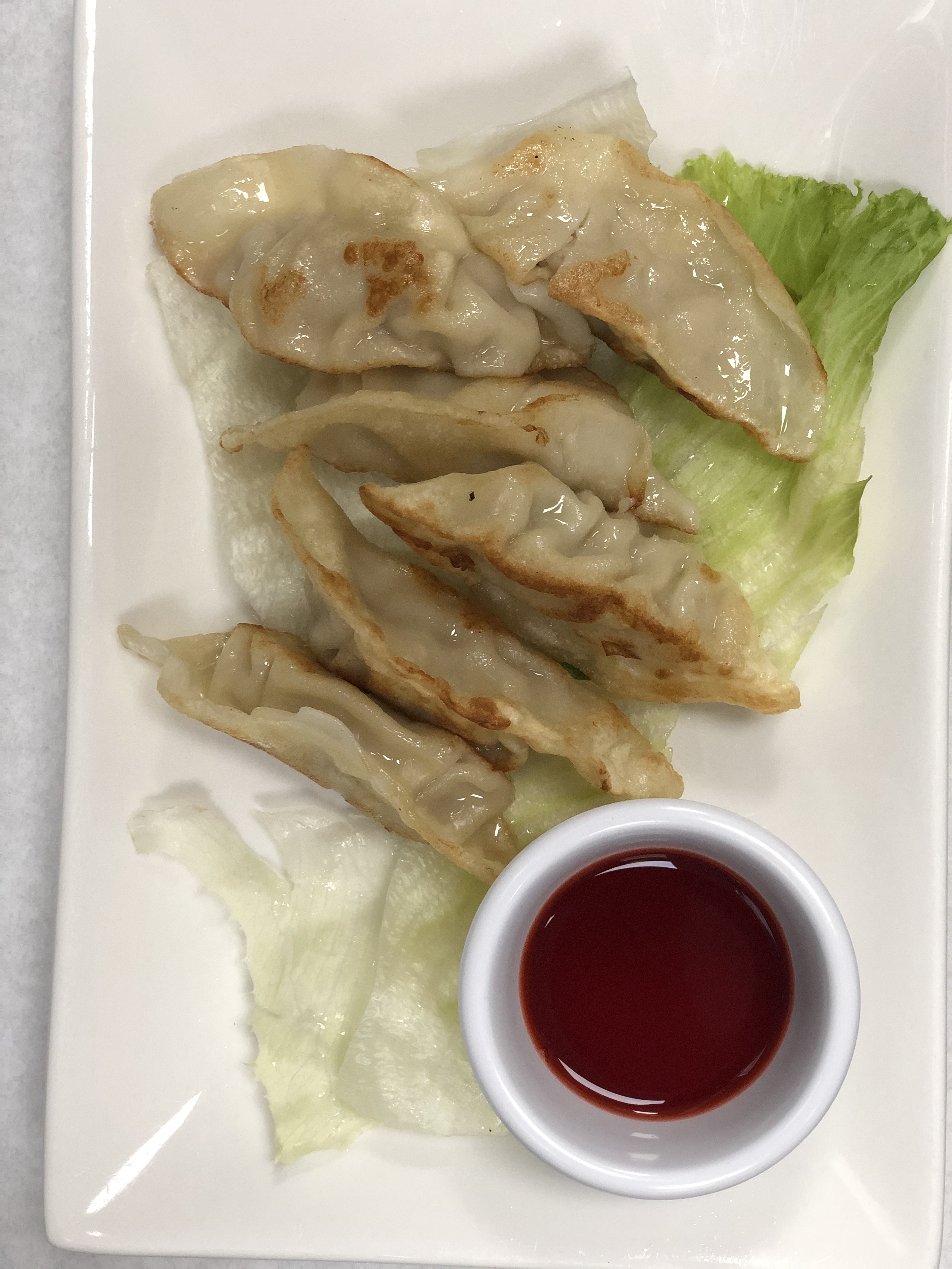 Order 57. Pot Stickers food online from Oasis Vietnamese Cuisine store, Pacifica on bringmethat.com