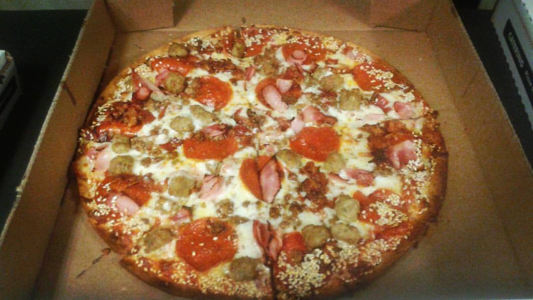 Order All Meat Round Pizza food online from Amiccis Pizza store, Detroit on bringmethat.com