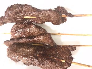 Order 8. Beef Sticks (4) 牛串 food online from Moon Wok store, Lenexa on bringmethat.com