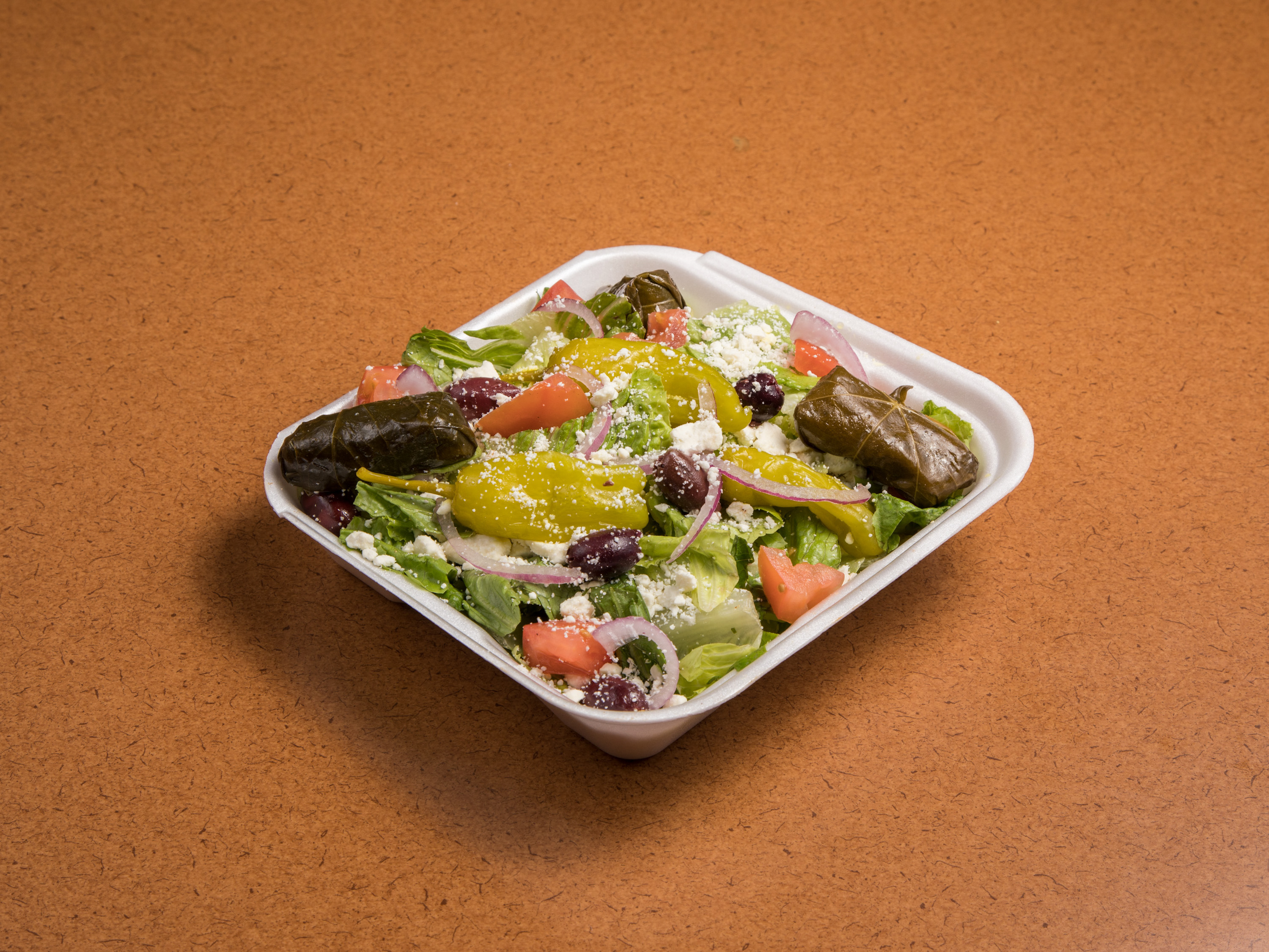 Order 44. Greek Salad food online from Rinaldi Italian Deli store, Scottsdale on bringmethat.com