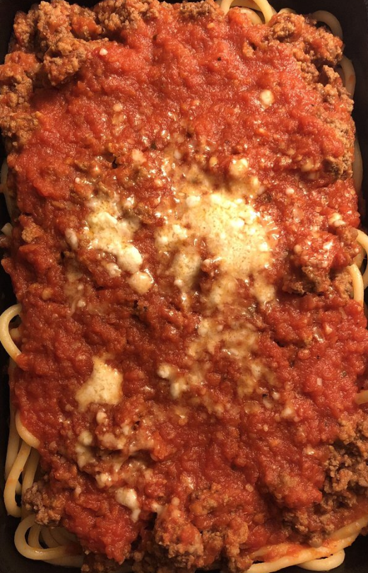 Order Spaghetti with Meat Sauce Dinner. Served with garlic bread food online from Pomodoro Pizza, Pasta & More store, Sterling on bringmethat.com