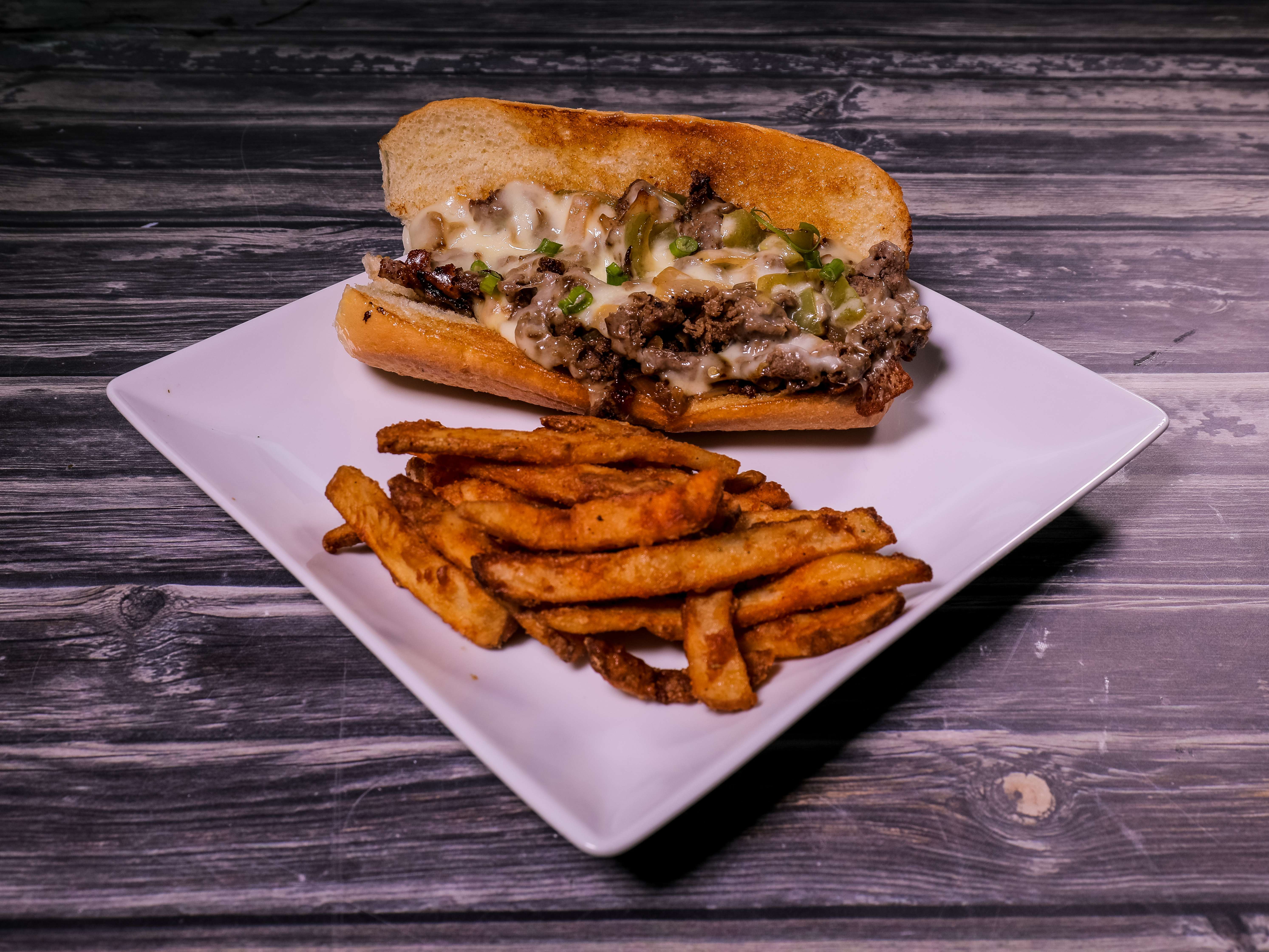 Order Philly Cheese Steak Sandwich food online from Timeout #1 store, Houston on bringmethat.com