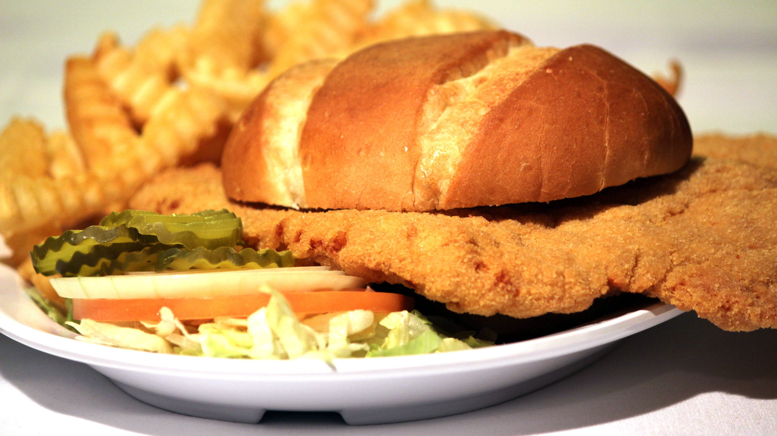 Order Pork Tenderloin Sandwich food online from Loughmillers Pub & Eatery store, Indianapolis on bringmethat.com