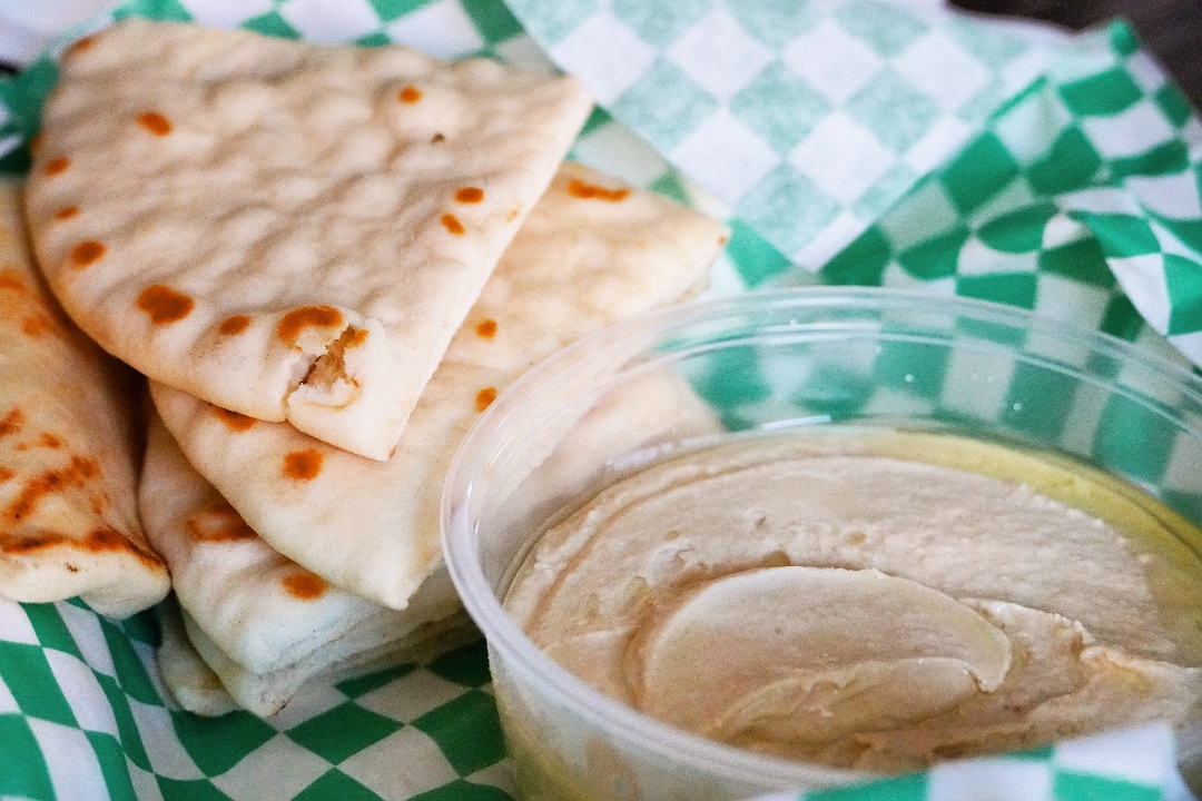 Order Hummus And Pita food online from Afro Deli store, Minneapolis on bringmethat.com