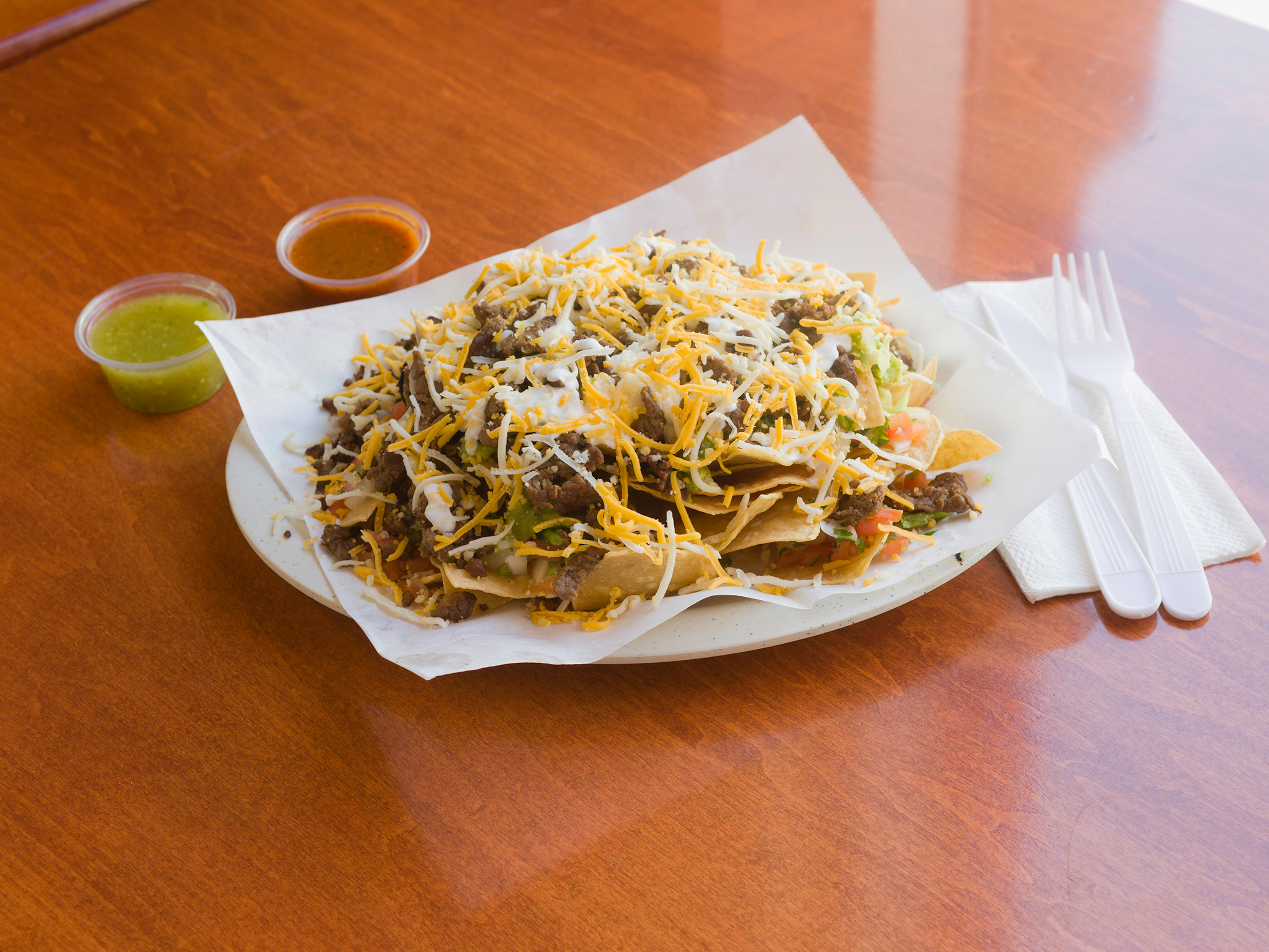 Order Super Nachos food online from Tosinos Mexican Grill store, Gilbert on bringmethat.com