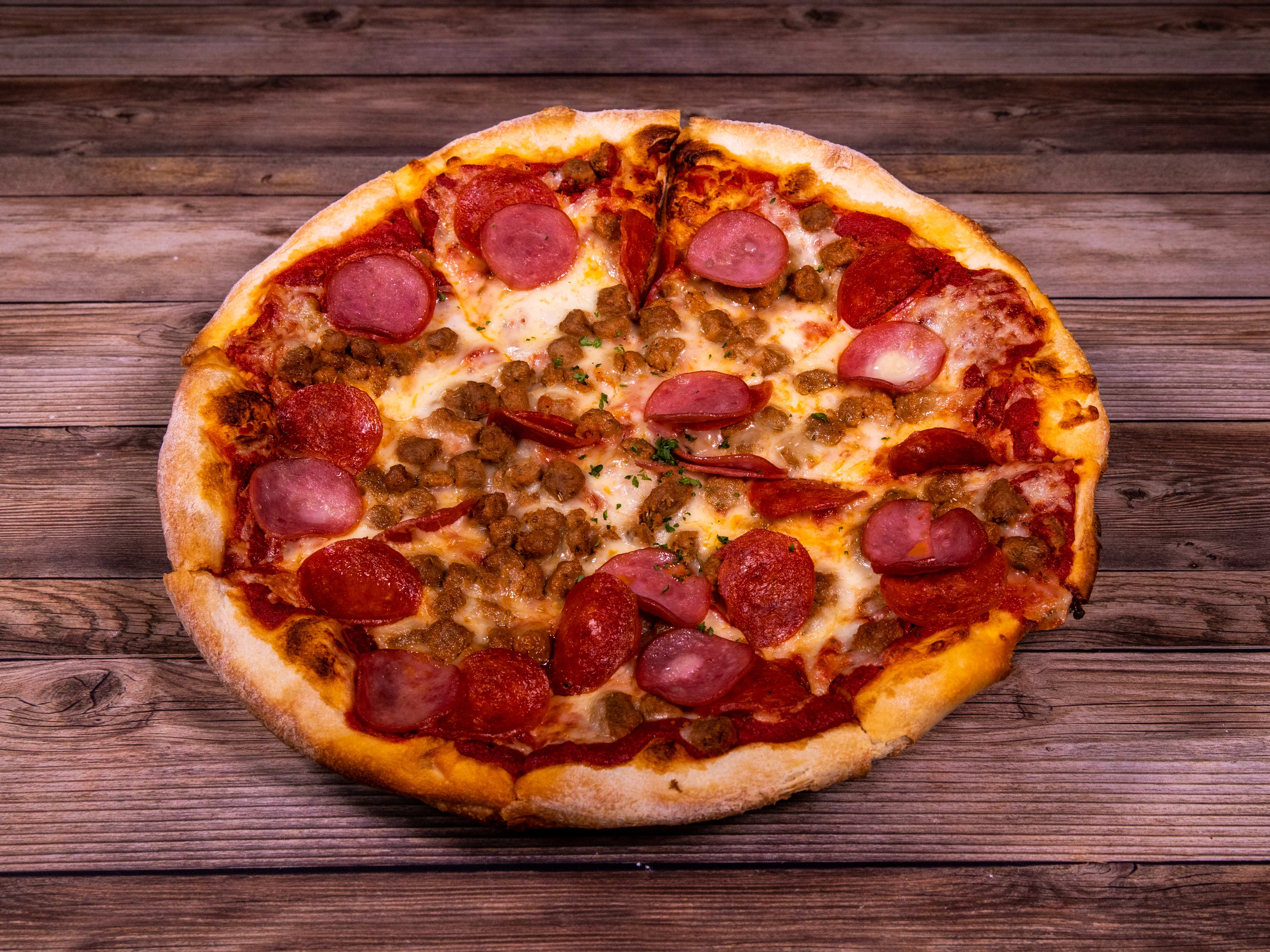 Order All Meat Pizza food online from Caprissi Pizza & Pasta store, Garland on bringmethat.com