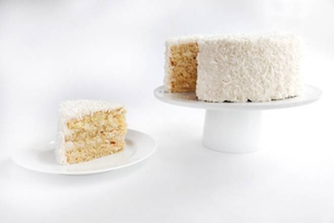 Order Tropical Coconut Cake food online from SusieCakes store, Studio City on bringmethat.com