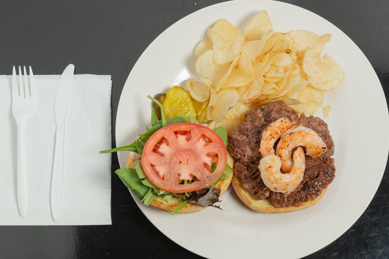 Order The Surf and Turf Burger (4 oz.) food online from Platesfromparis store, Philadelphia on bringmethat.com