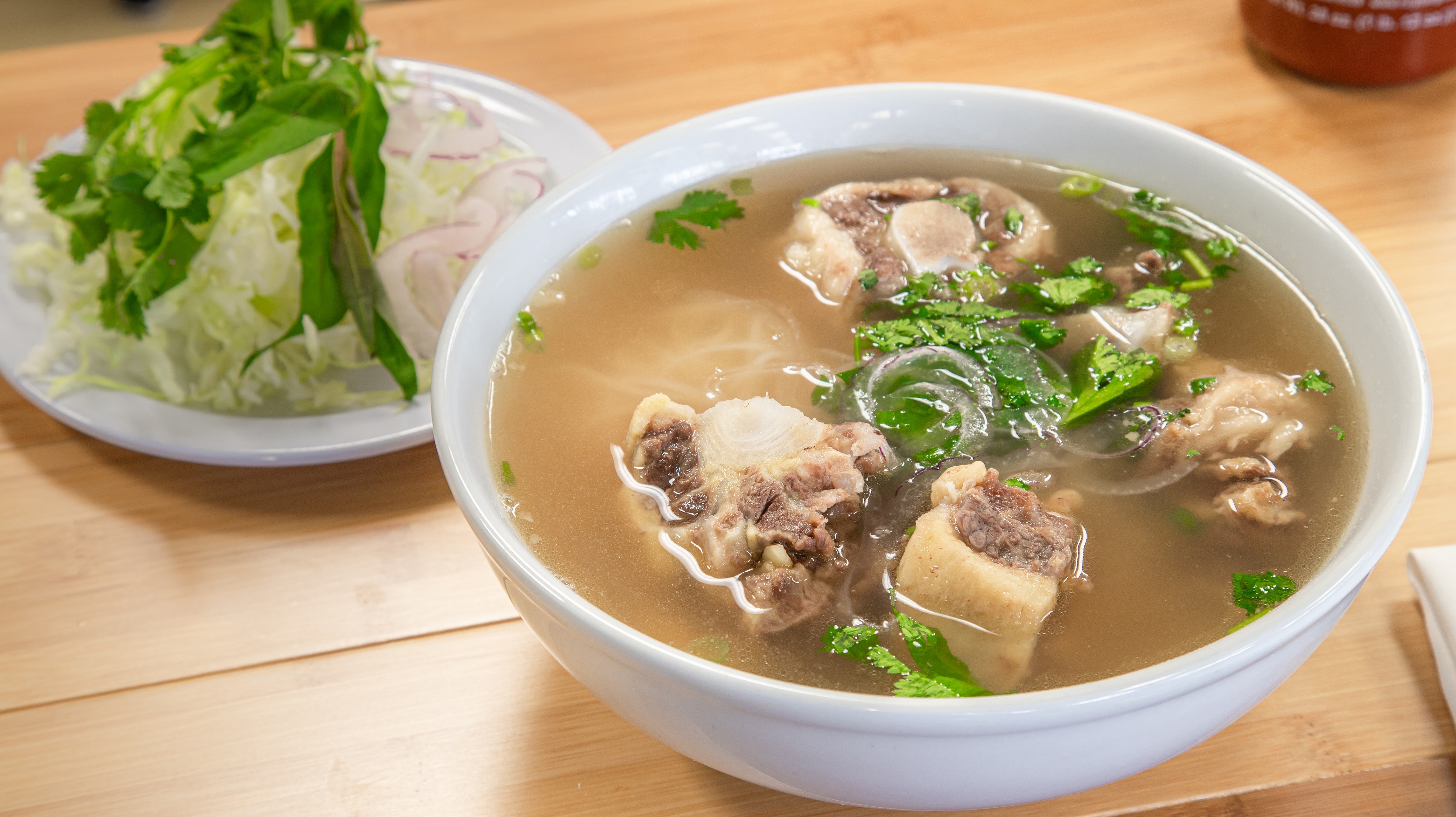 Order 16. Pho Oxtail food online from Pho Cafe Hong Kong Diner store, Reno on bringmethat.com