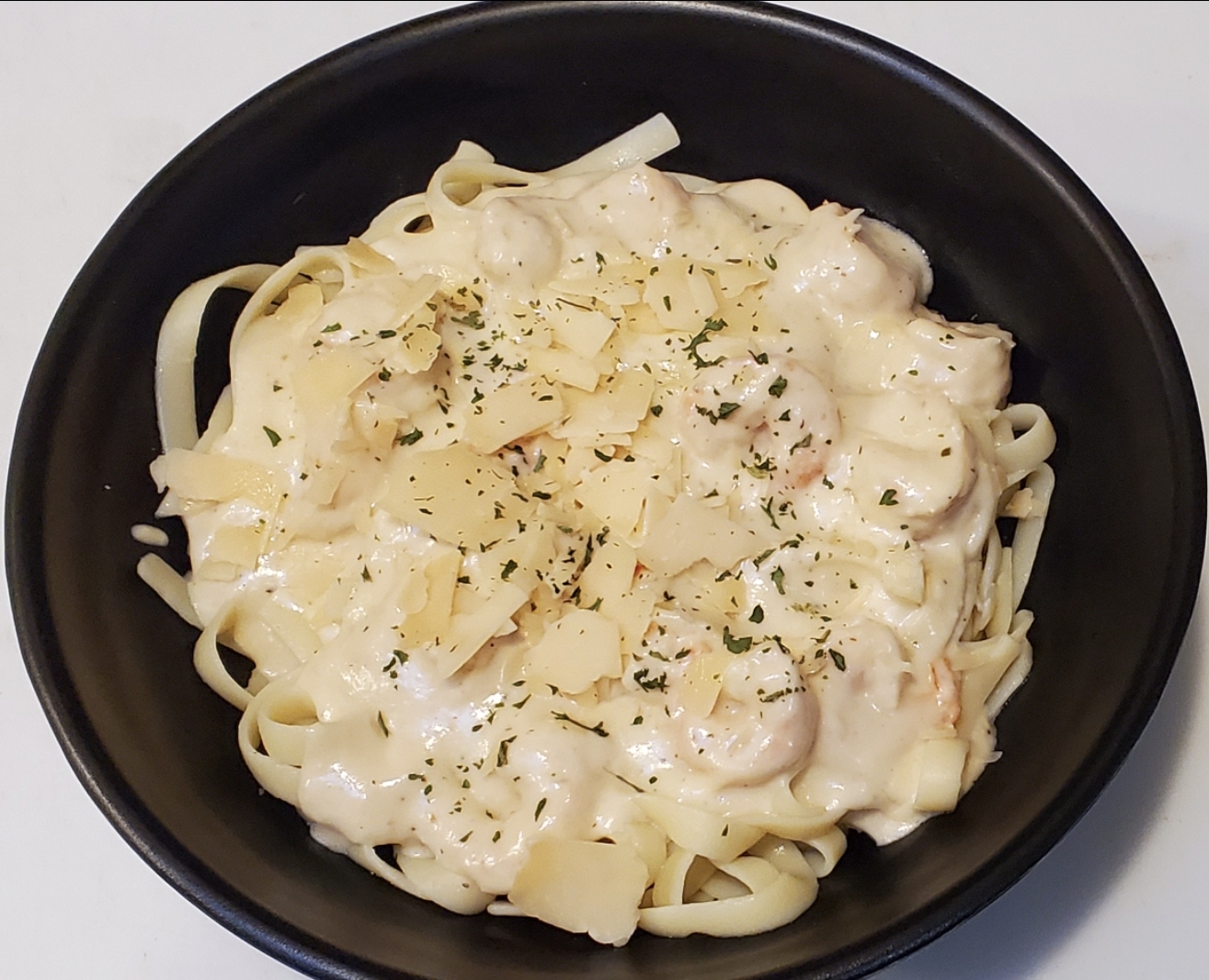 Order Creamy Shrimp Fettuccine with Home-Made Alfredo food online from Hayes Pizza store, San Francisco on bringmethat.com