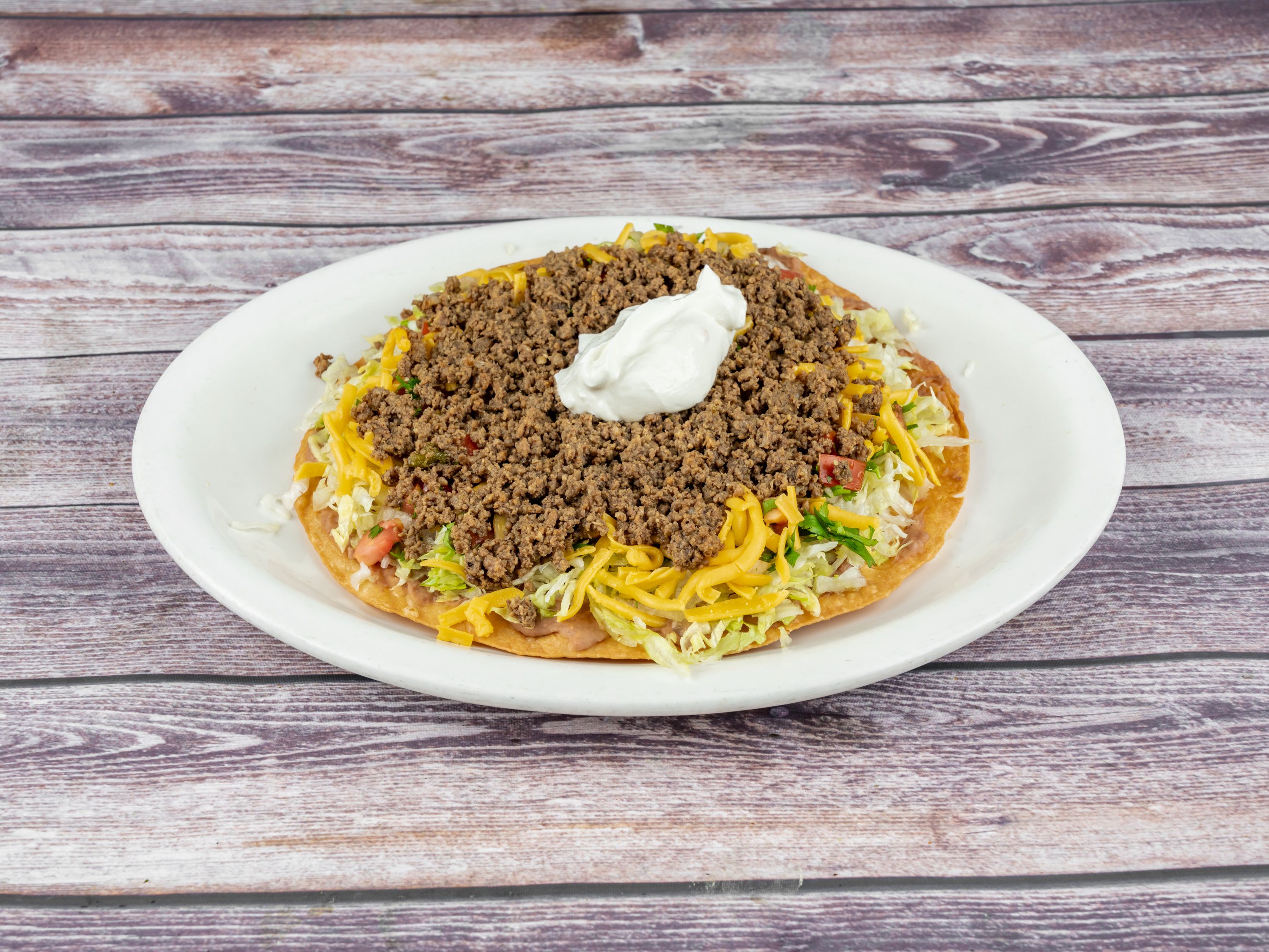 Order Fuzzy's Tostadas food online from Tequila Lopez Mexican Restaurant store, Houston on bringmethat.com