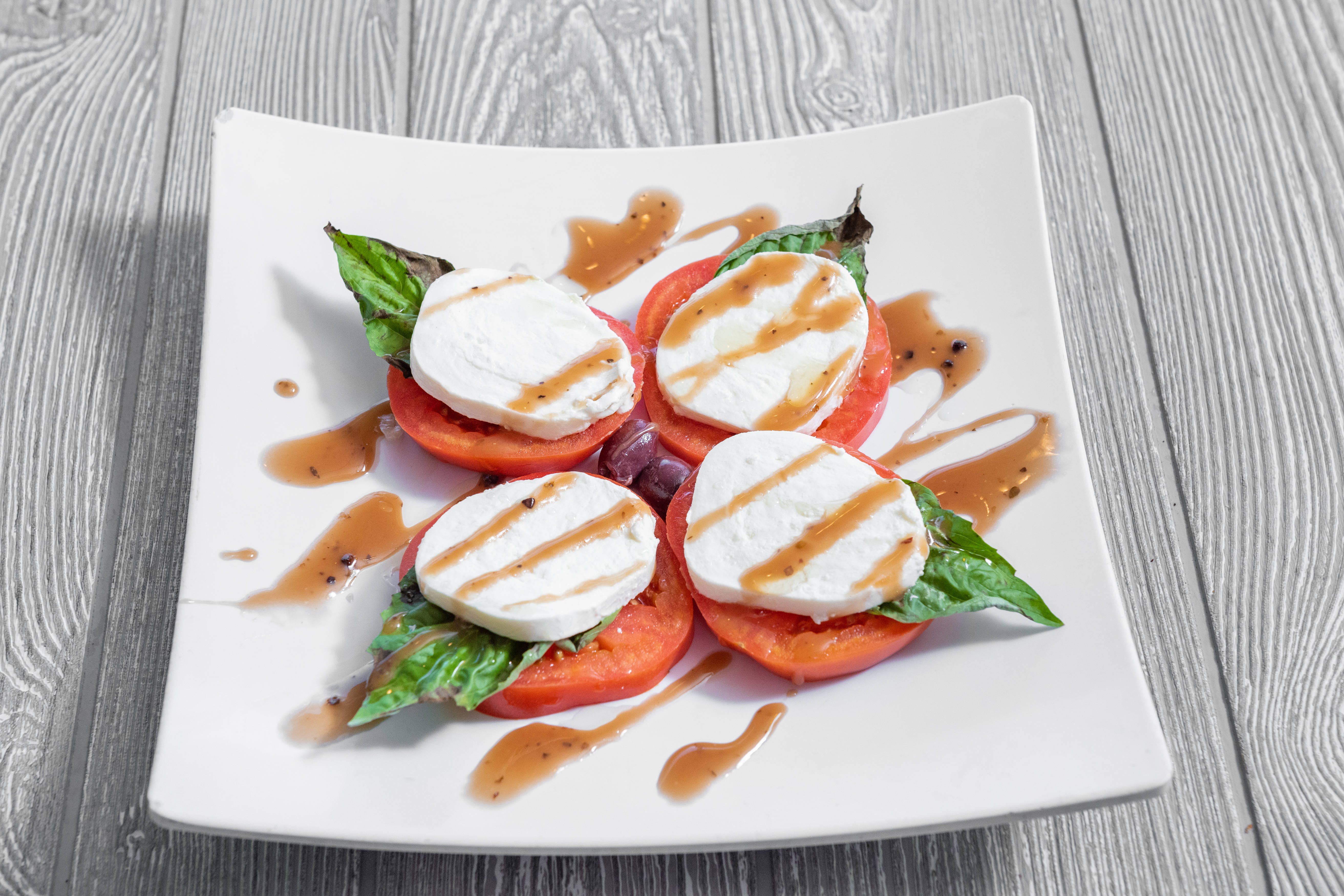 Order Tomato Caprese - Appetizer food online from Fontana Pizza & Grill store, Exton on bringmethat.com