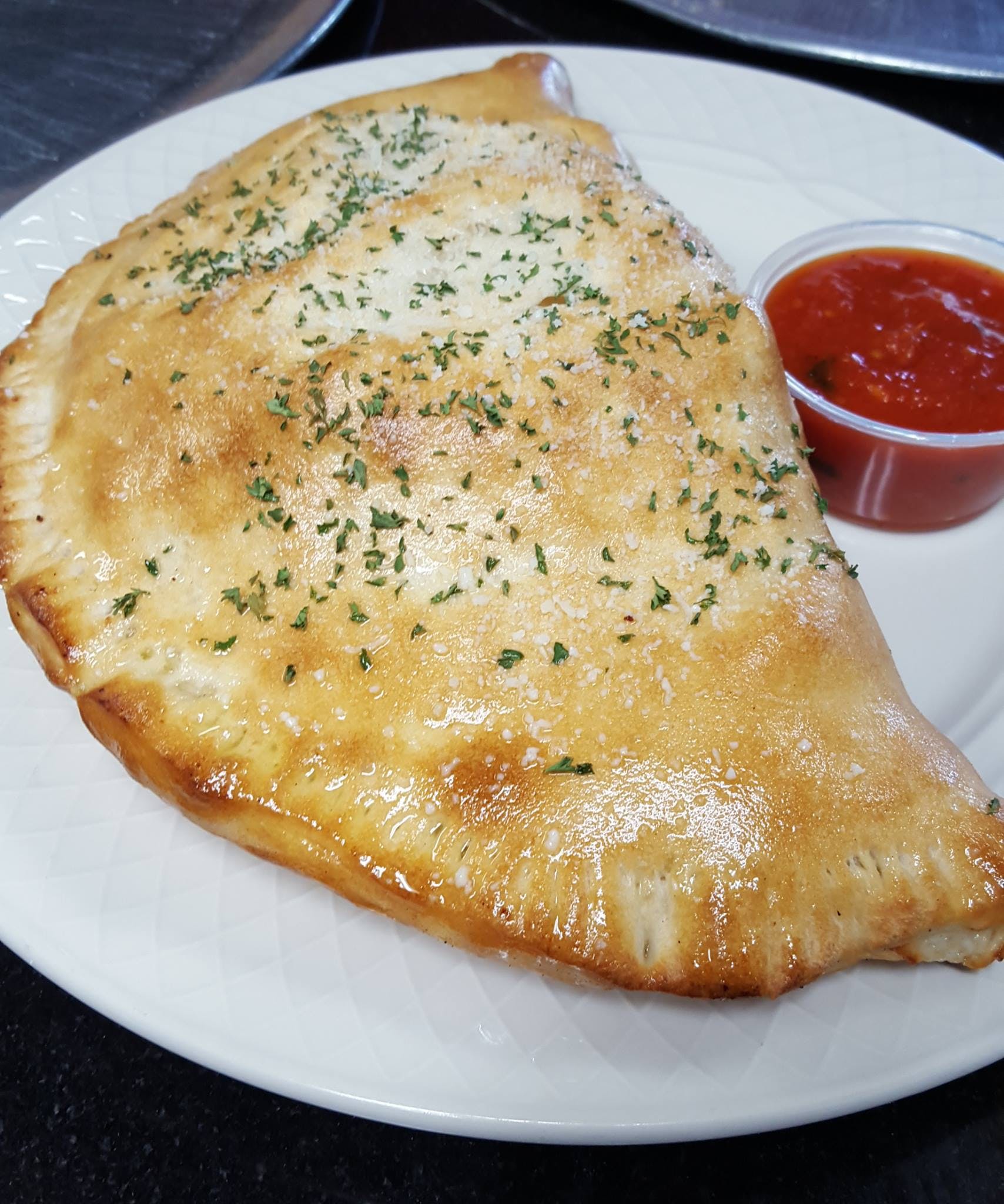 Order Cheese Calzone - Calzone food online from Tony's Pizza & Pasta store, Plymouth Meeting on bringmethat.com