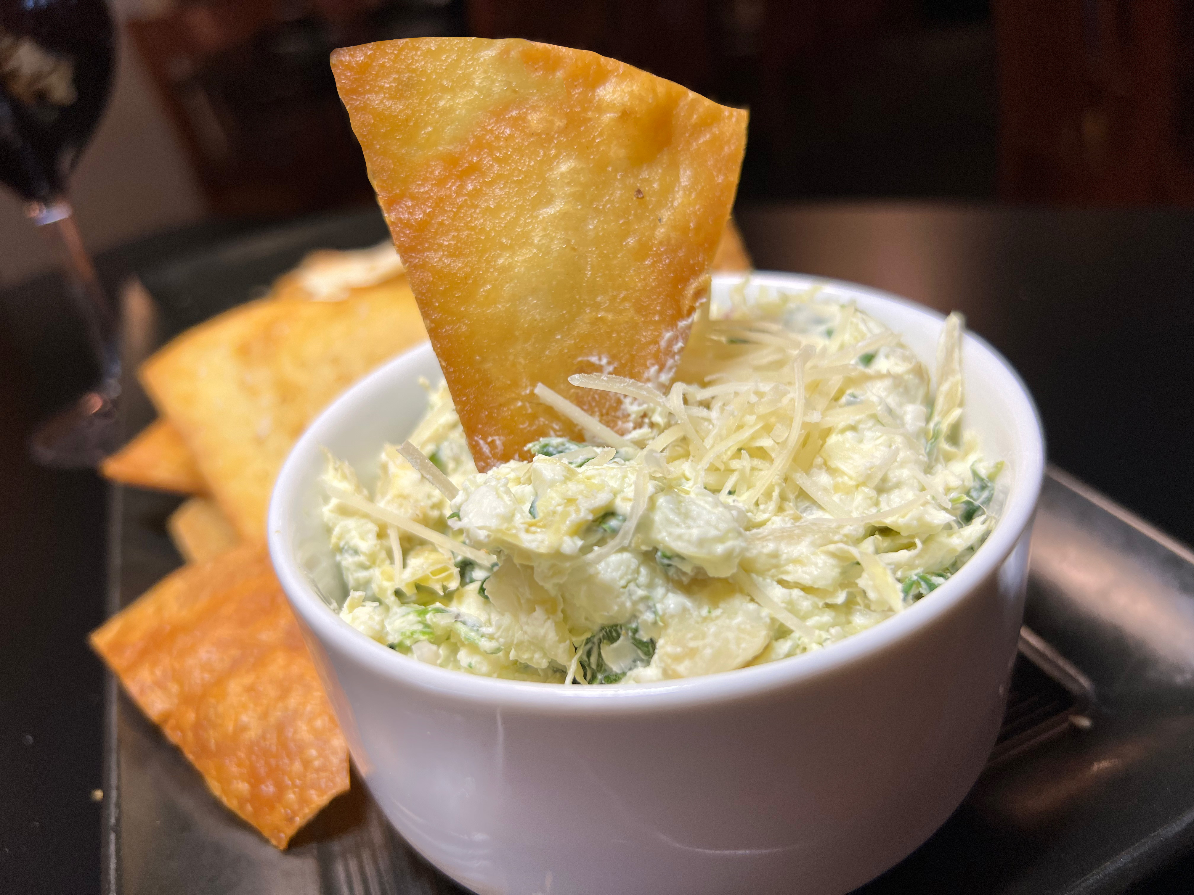 Order Artichoke-Spinach Dip food online from Taxi Grille & Bar store, Omaha on bringmethat.com