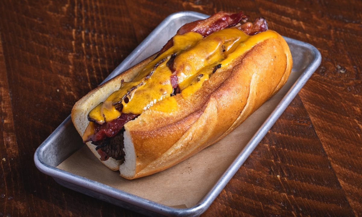 Order Bacon Cheddar Buck Tri Tip Sandwich food online from Buckhorn Grill store, Vacaville on bringmethat.com