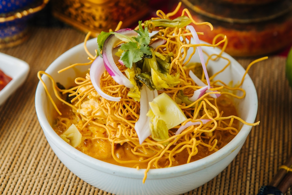 Order Khow Soy (Yellow Curry Noodle) food online from Banana Leaf Thai Cuisine store, Dallas on bringmethat.com
