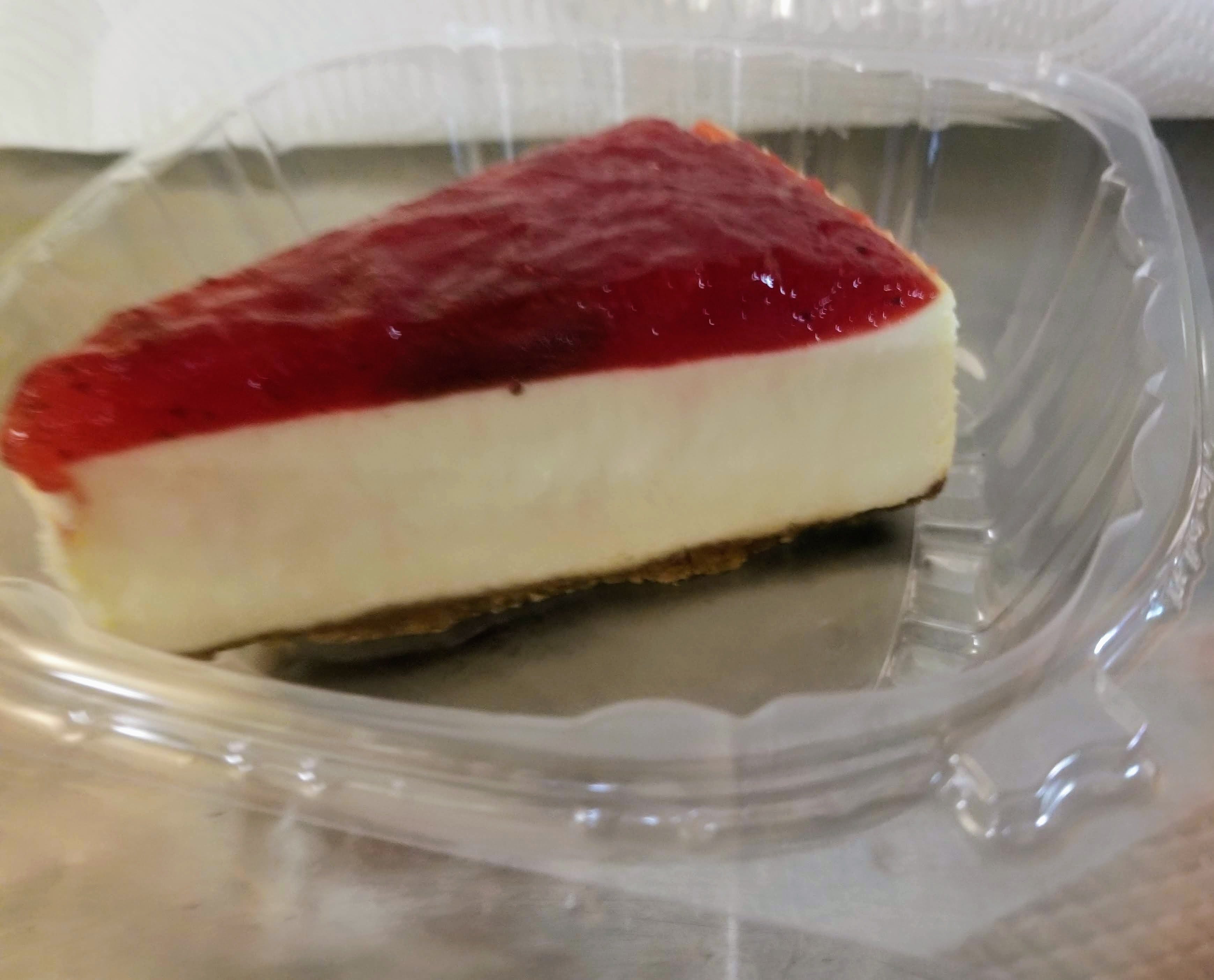 Order Strawberry Cheesecake - Slice food online from Novotny's Groceries & Pizza store, Worthington on bringmethat.com