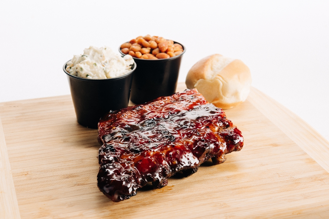 Order Rib Plate - 4 Bones food online from Whole Hog Cafe store, Cherry Hill on bringmethat.com