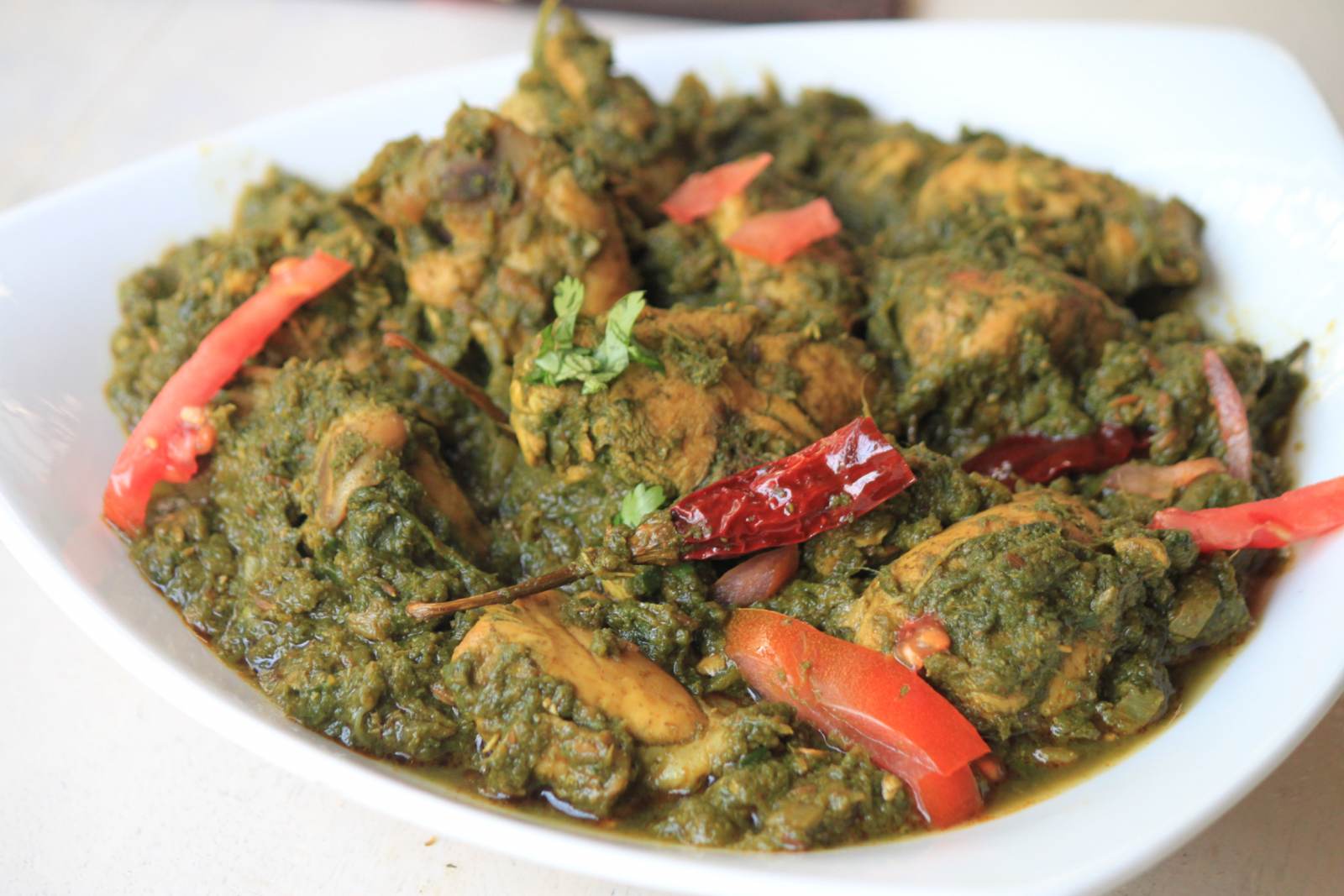 Order Chicken Saagwala food online from Guru Palace store, North Brunswick on bringmethat.com