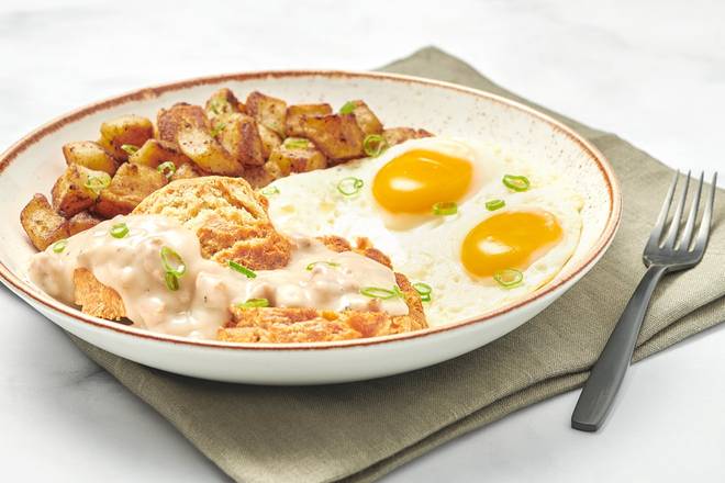Order Biscuits & Turkey Sausage Gravy with Eggs food online from First Watch store, Louisville on bringmethat.com