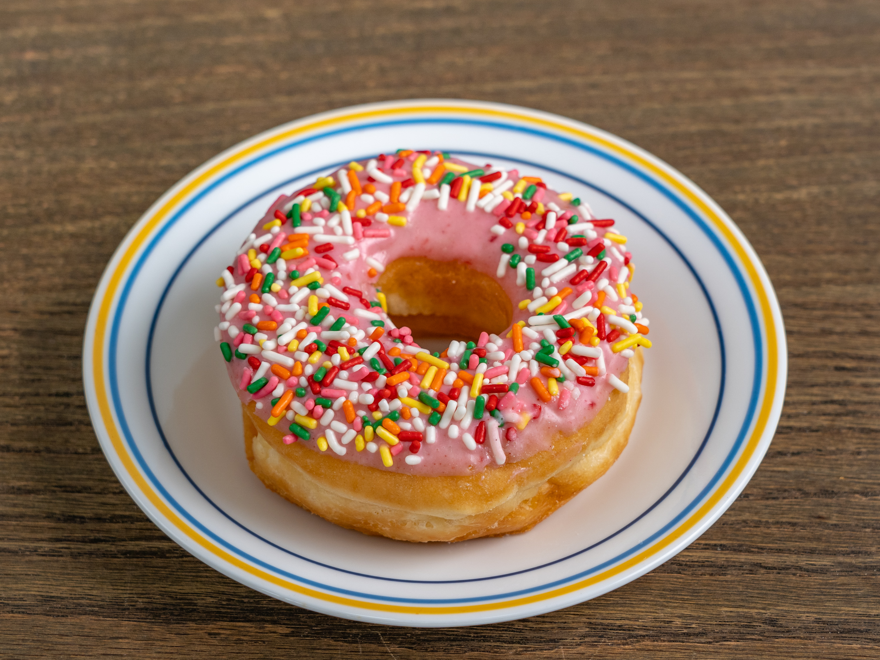 Order Assorted Sprinkles Donut food online from Snowflake Donuts store, Boerne on bringmethat.com