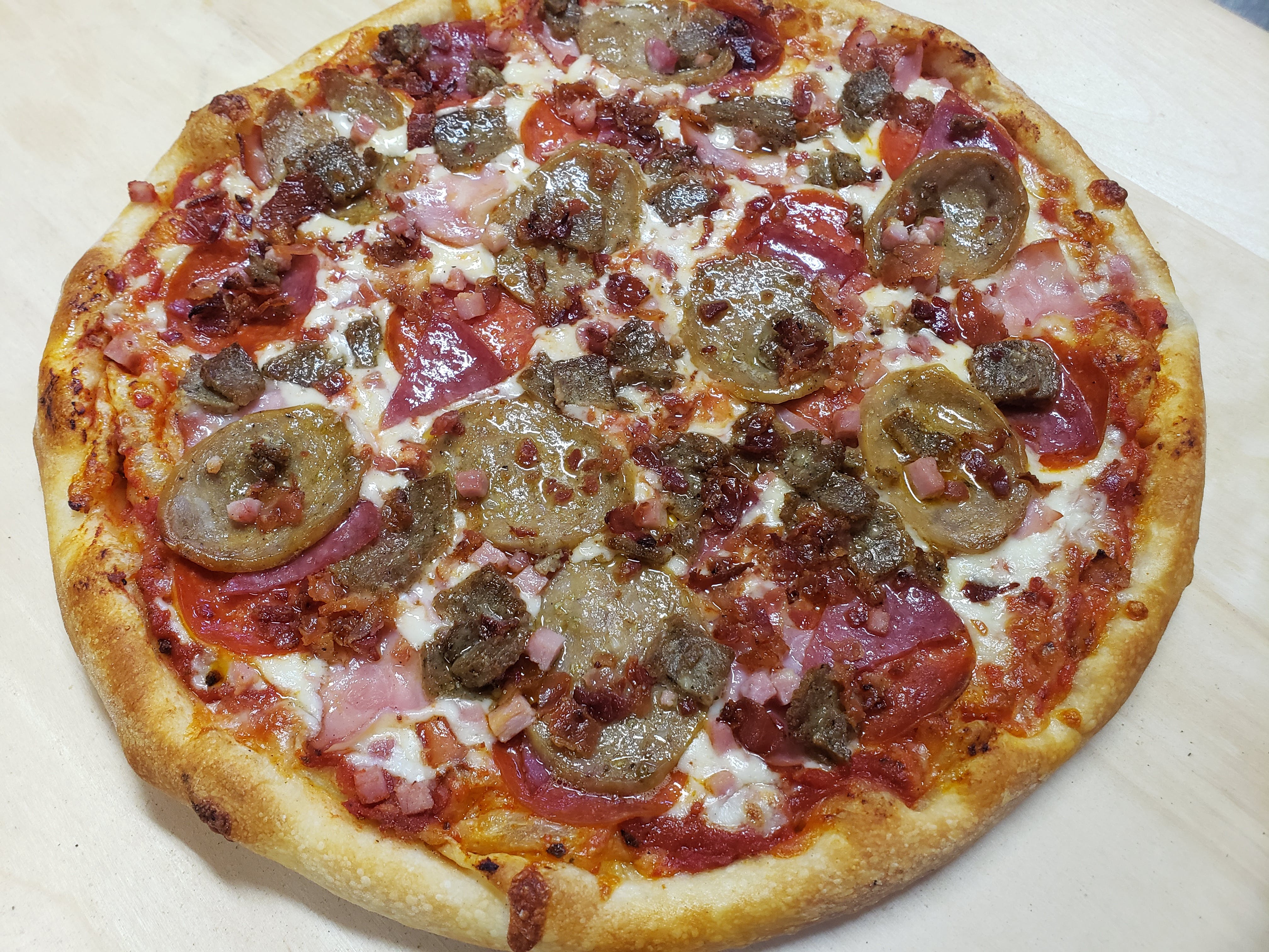 Order All Meat Pizza - Small 10" food online from Belleview Pizza & Italian Restaurant store, Belleview on bringmethat.com