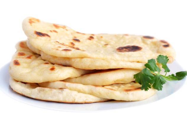 Order Plain Naan food online from Flavours store, Omaha on bringmethat.com