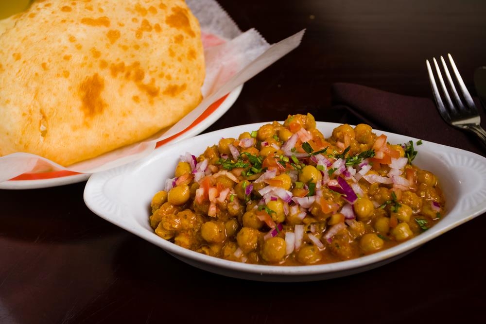 Order Chole Bhatura food online from Dhaba indian cuisine store, New York on bringmethat.com