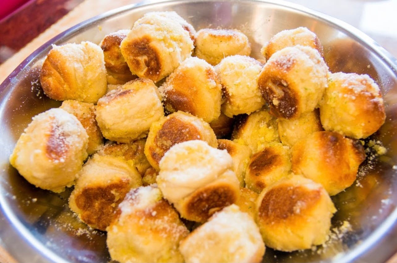 Order Garlic Knots - 4 Pieces food online from Tuscan Pizza store, Sicklerville on bringmethat.com
